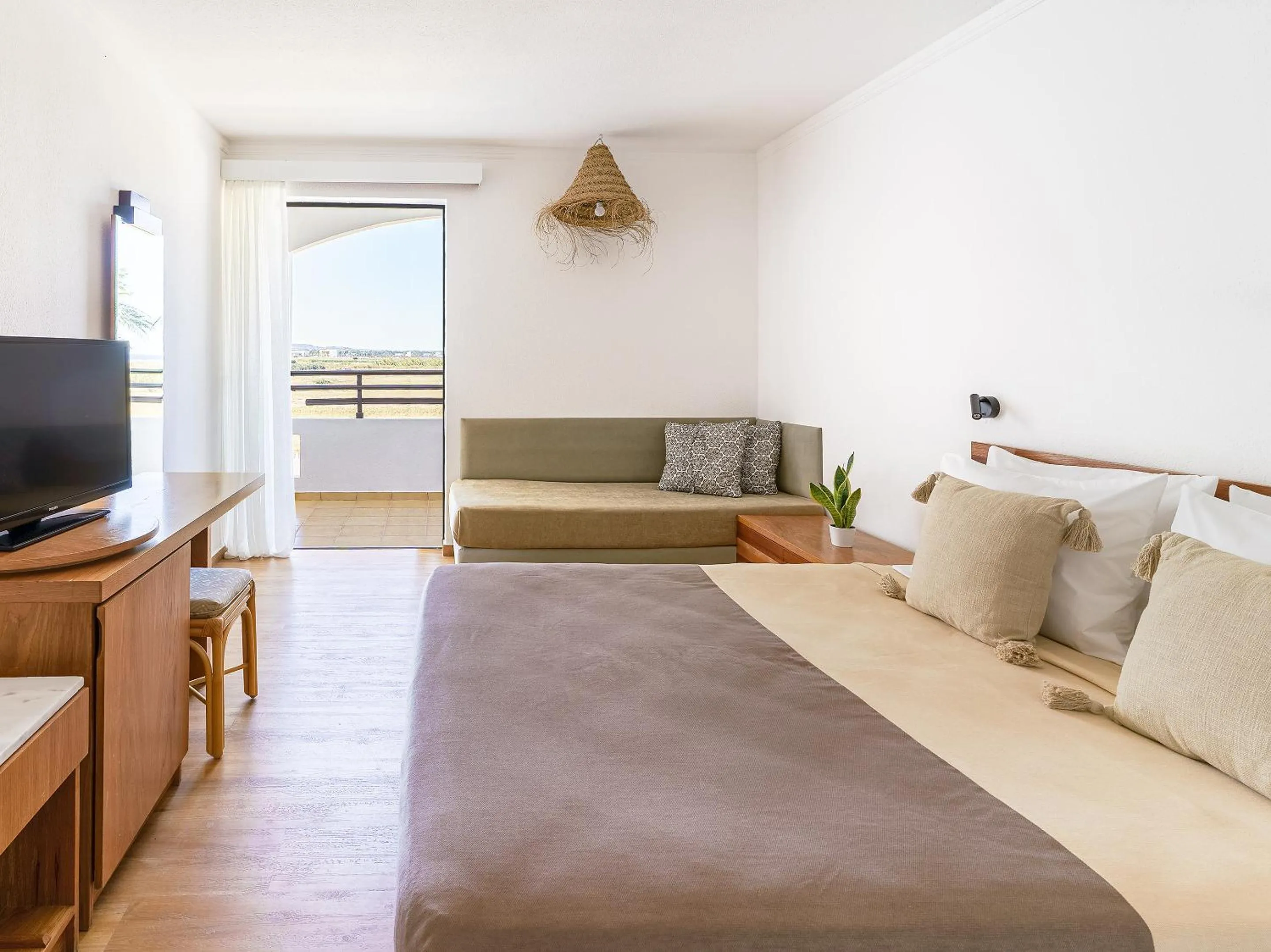 Seating area, Bed in Grecotel Casa Paradiso