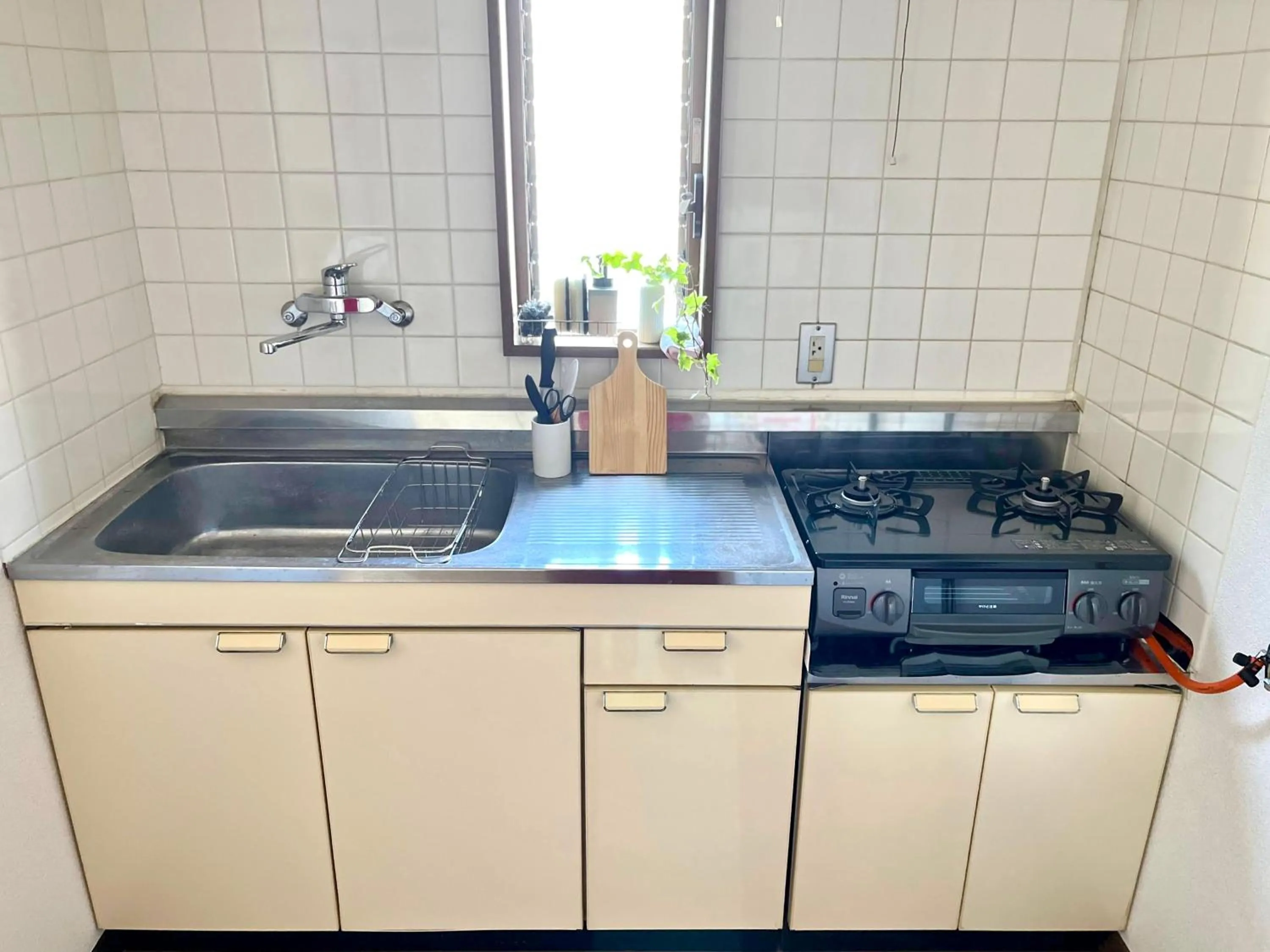 Kitchen or kitchenette in ᛃ 眠りの癒 ᛃ Cozy Apt In The Heart of Beppu 201