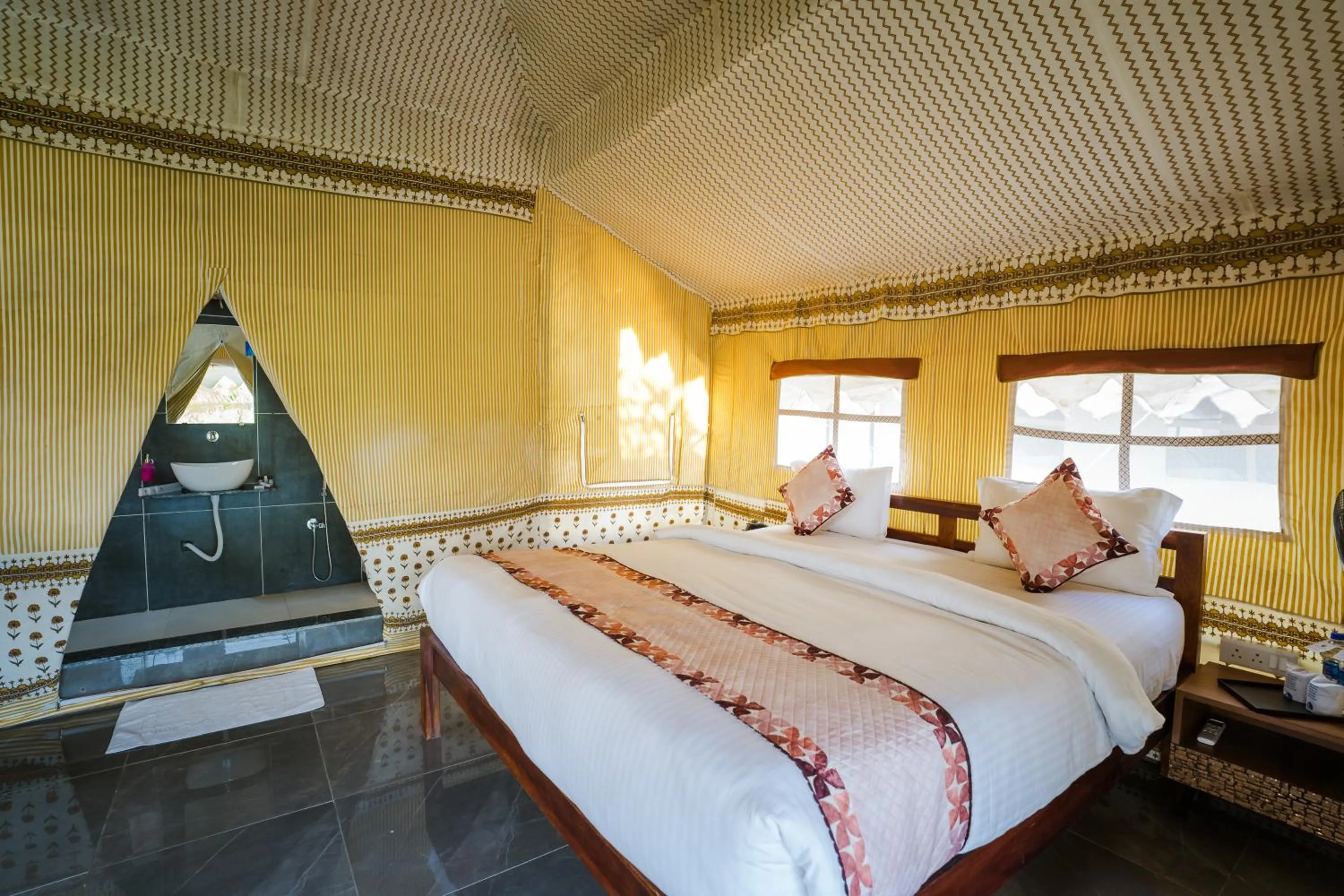 Bed in RiverView Tent Resort