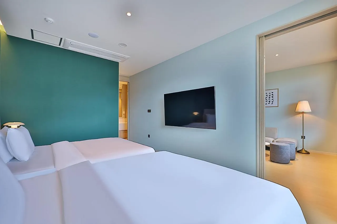 Bed in Browndot Signature Hotel