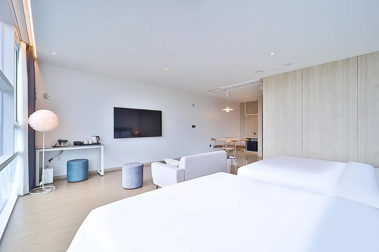 Bed in Browndot Signature Hotel