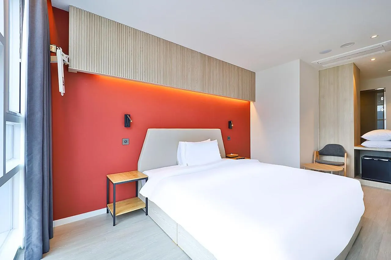 Bed in Browndot Signature Hotel