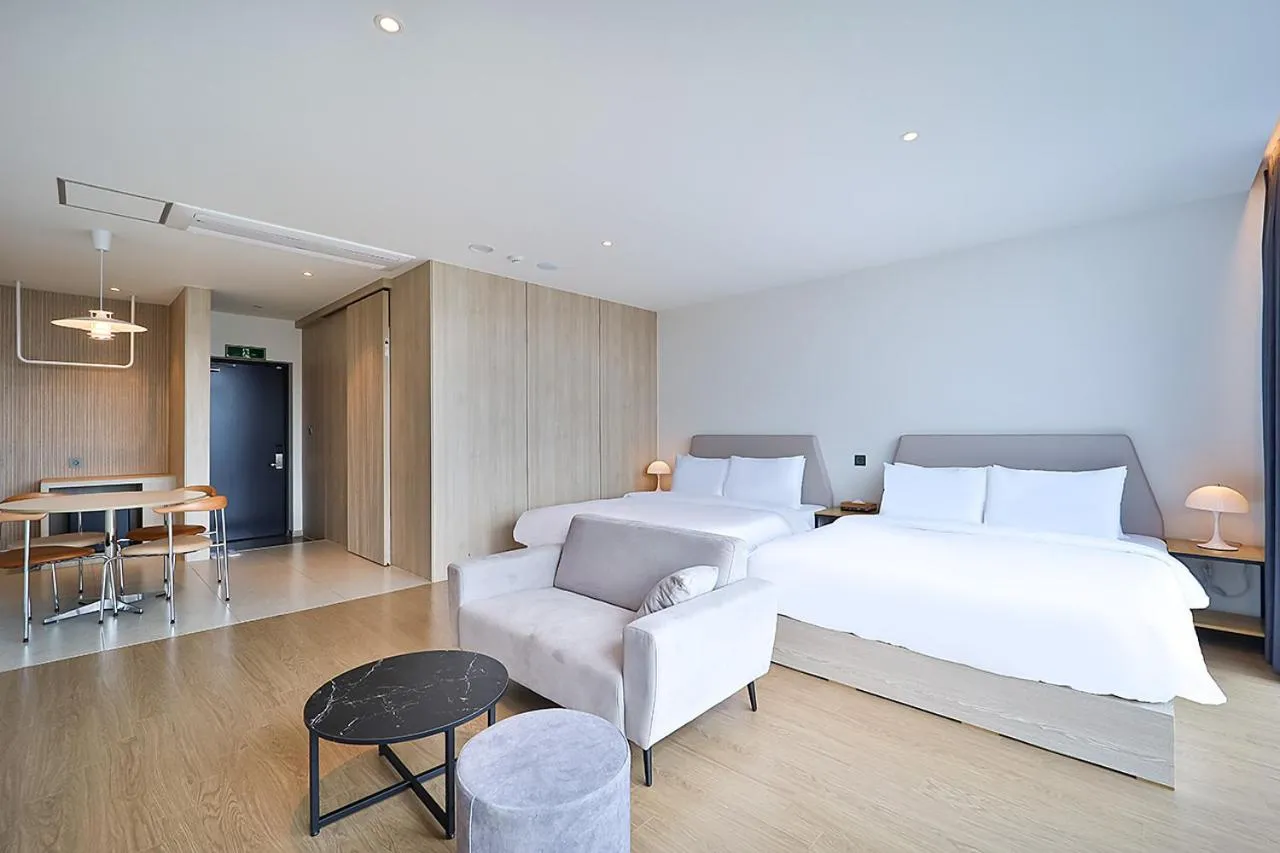 Bed in Browndot Signature Hotel