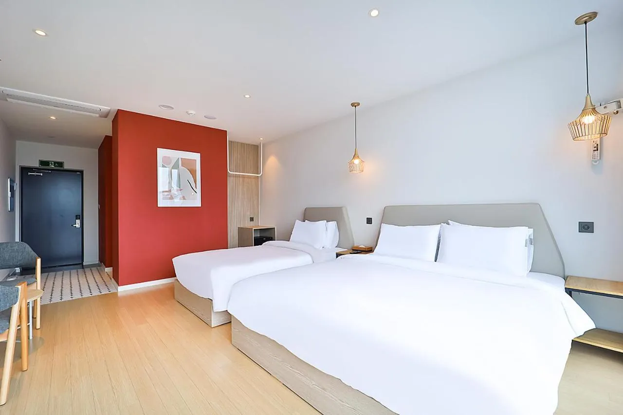 Bed in Browndot Signature Hotel