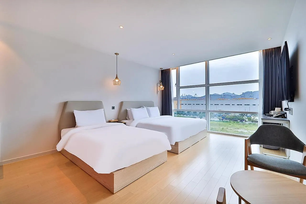 Bed in Browndot Signature Hotel