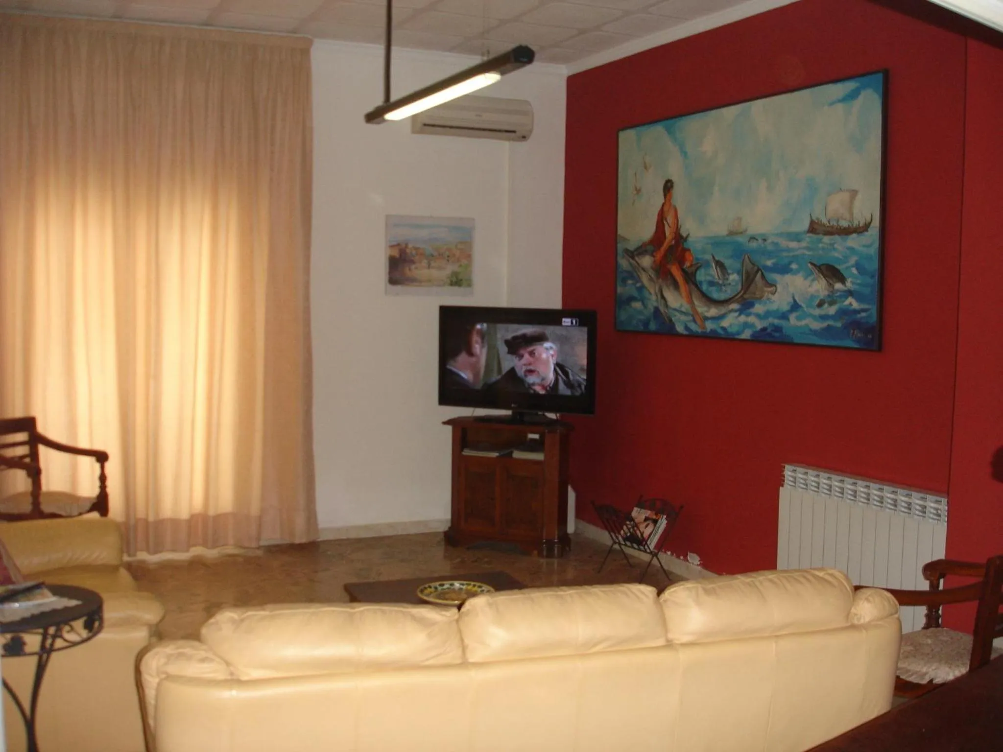 Communal lounge/ TV room in Hotel La Rusticana