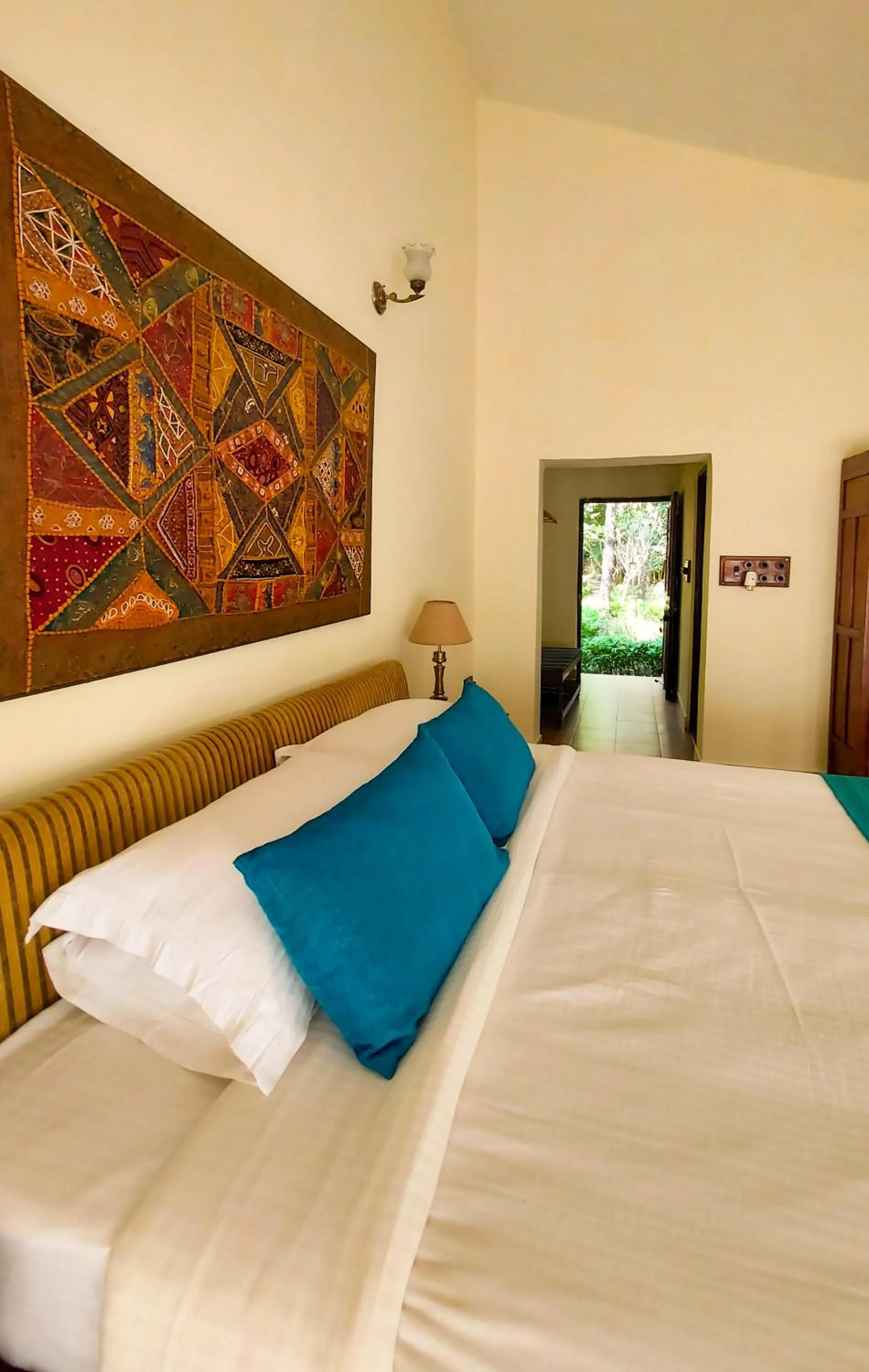 Bed in Bandhavgarh Jungle Lodge