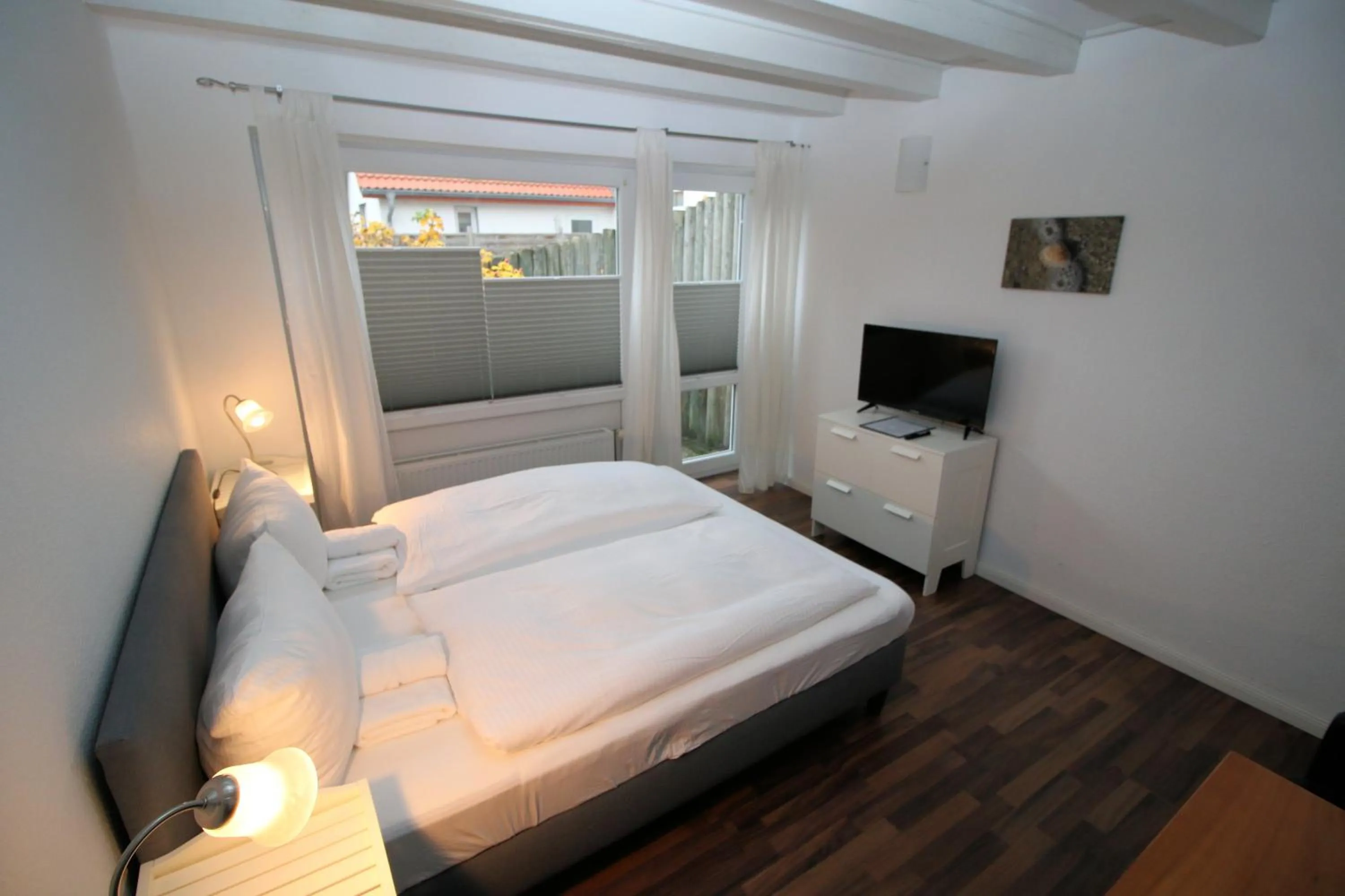 Photo of the whole room, Bed in Haus Bomhoff Sylt