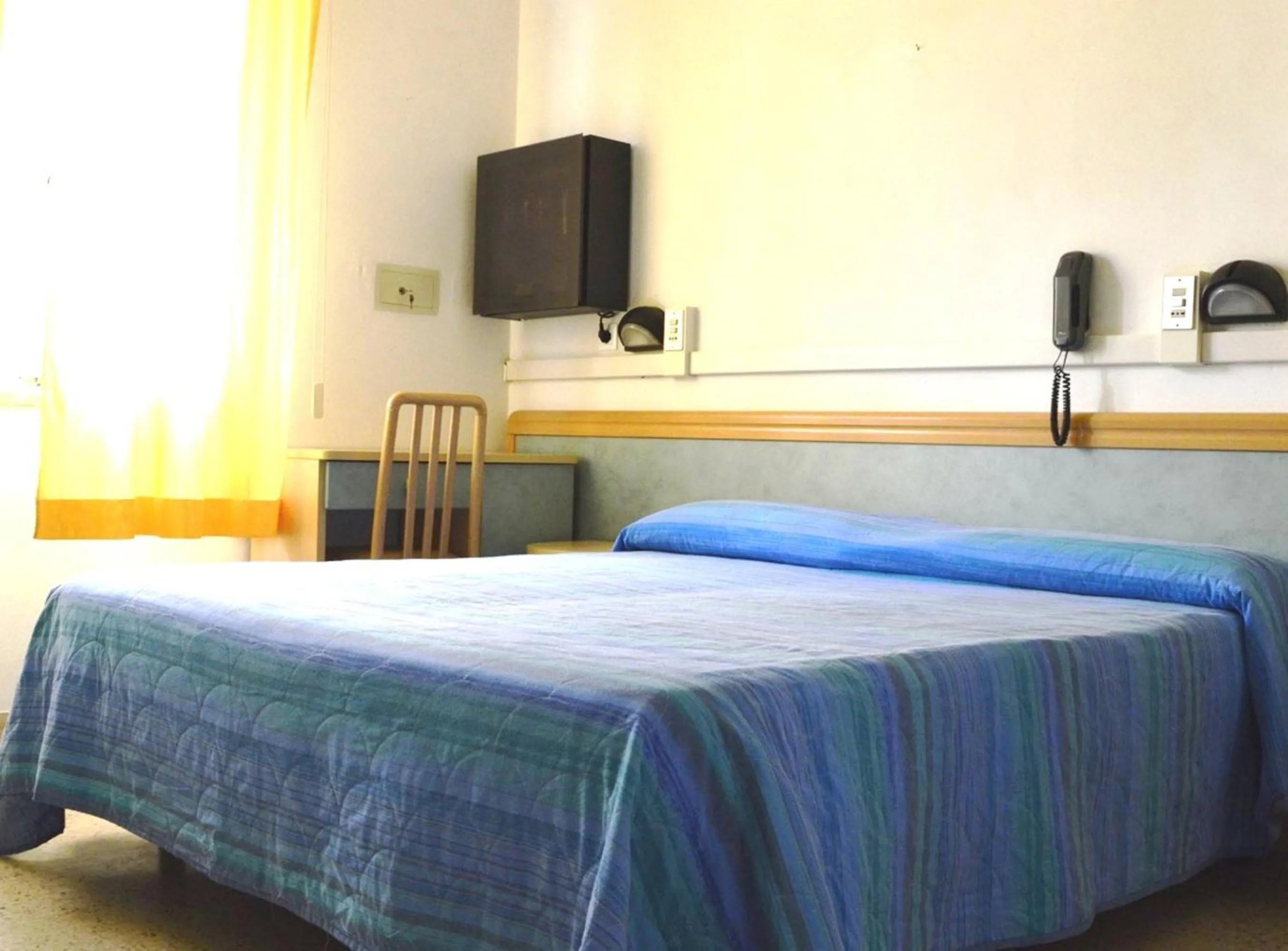 Bedroom in Hotel Lux