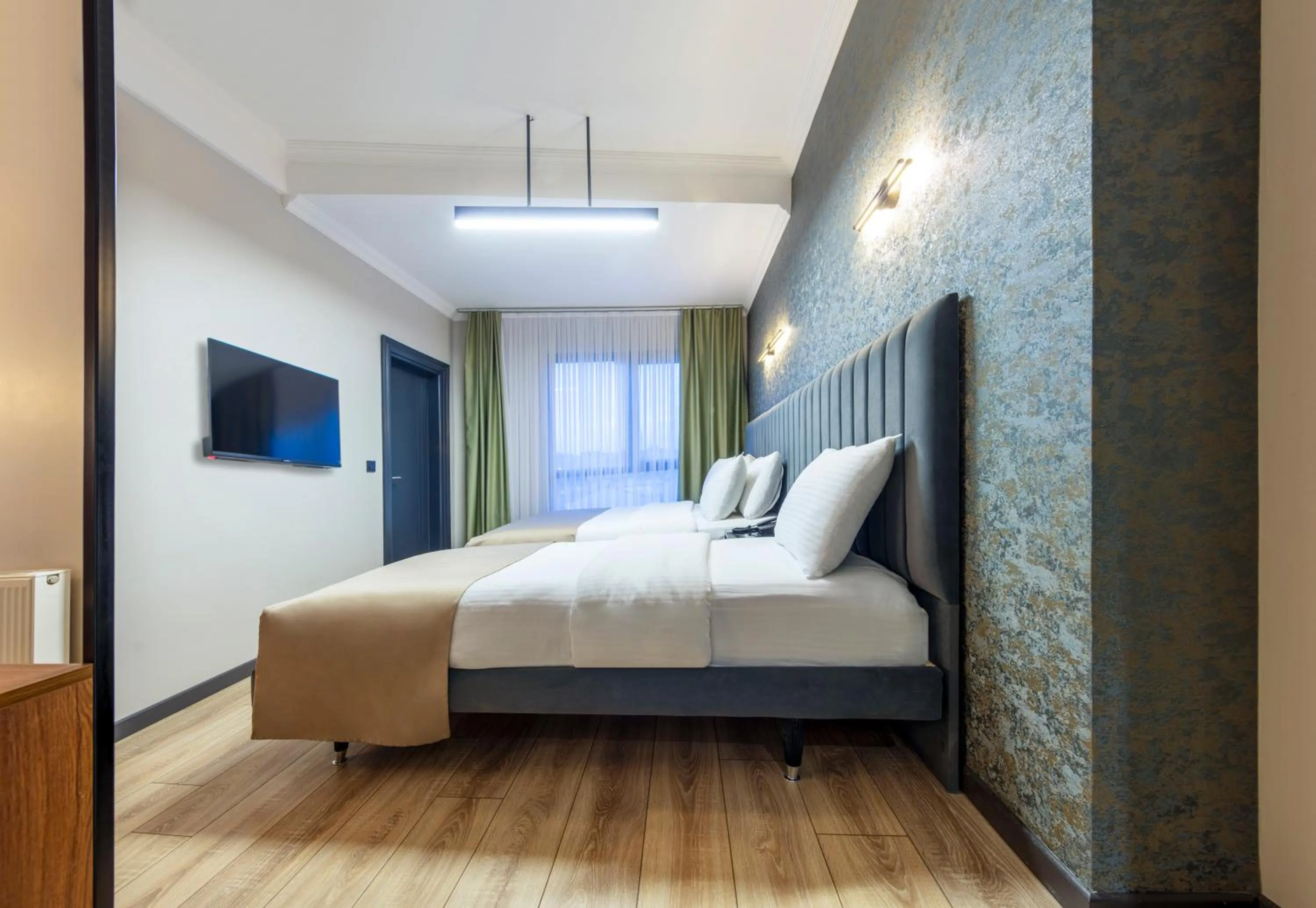 Bed in Lenora Airport Hotel