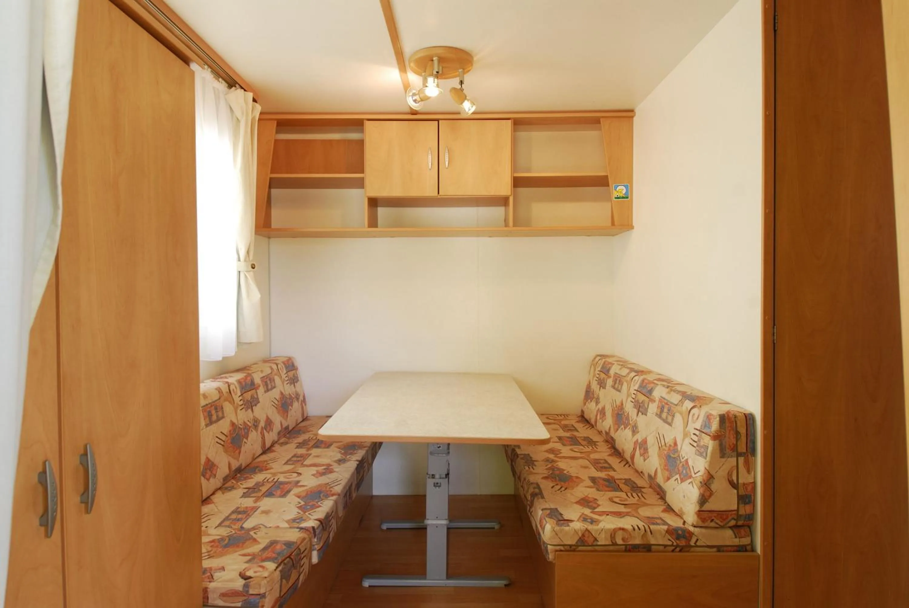 Living room in Camping Village Capo D'Orso