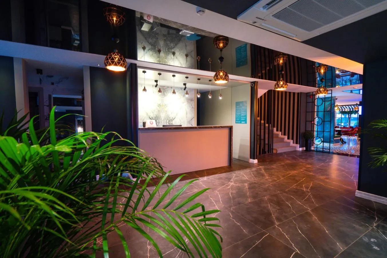 Lobby or reception in Basel Hotel