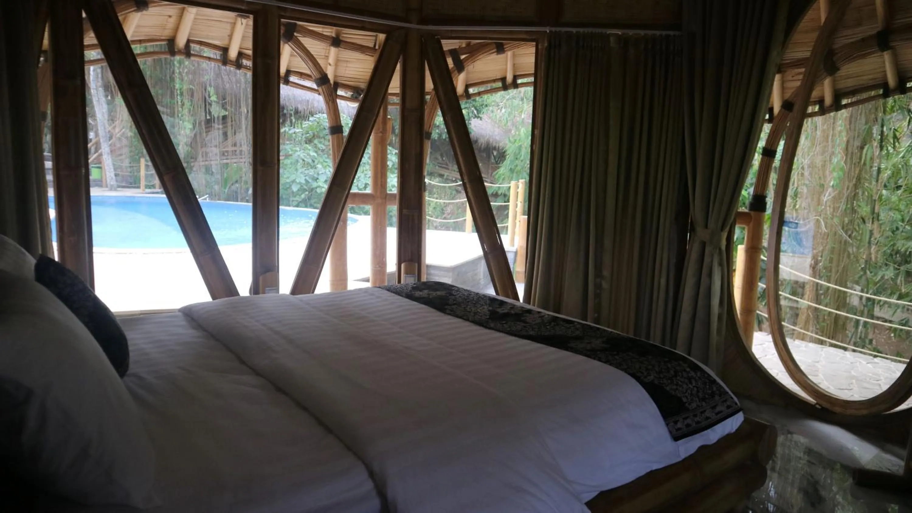 Bed in The Osing Bamboo Resort - a LIBERTA Collection