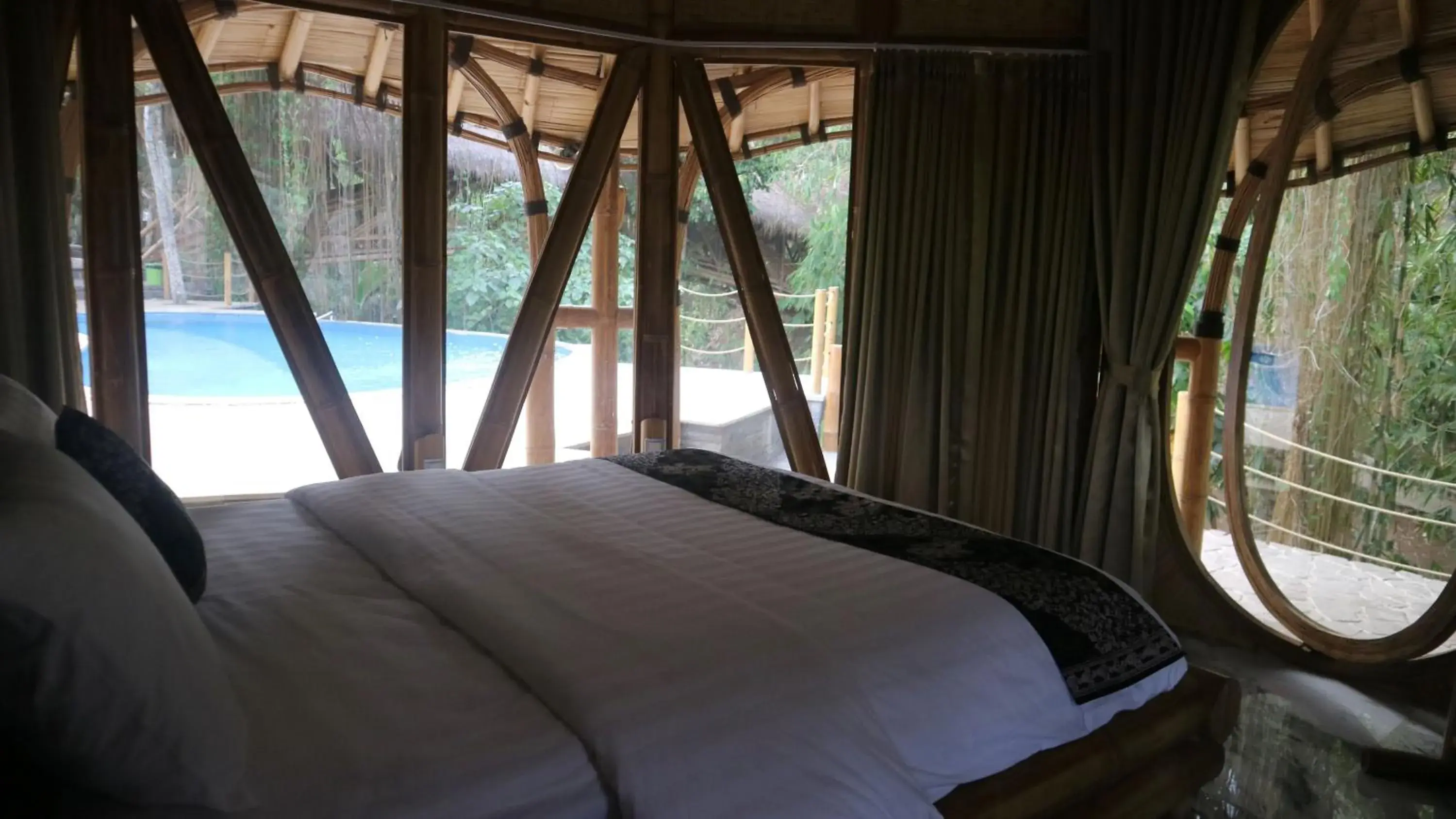Bed in The Osing Bamboo Resort - a LIBERTA Collection Bed in The Osing Bamboo Resort - a LIBERTA Collection