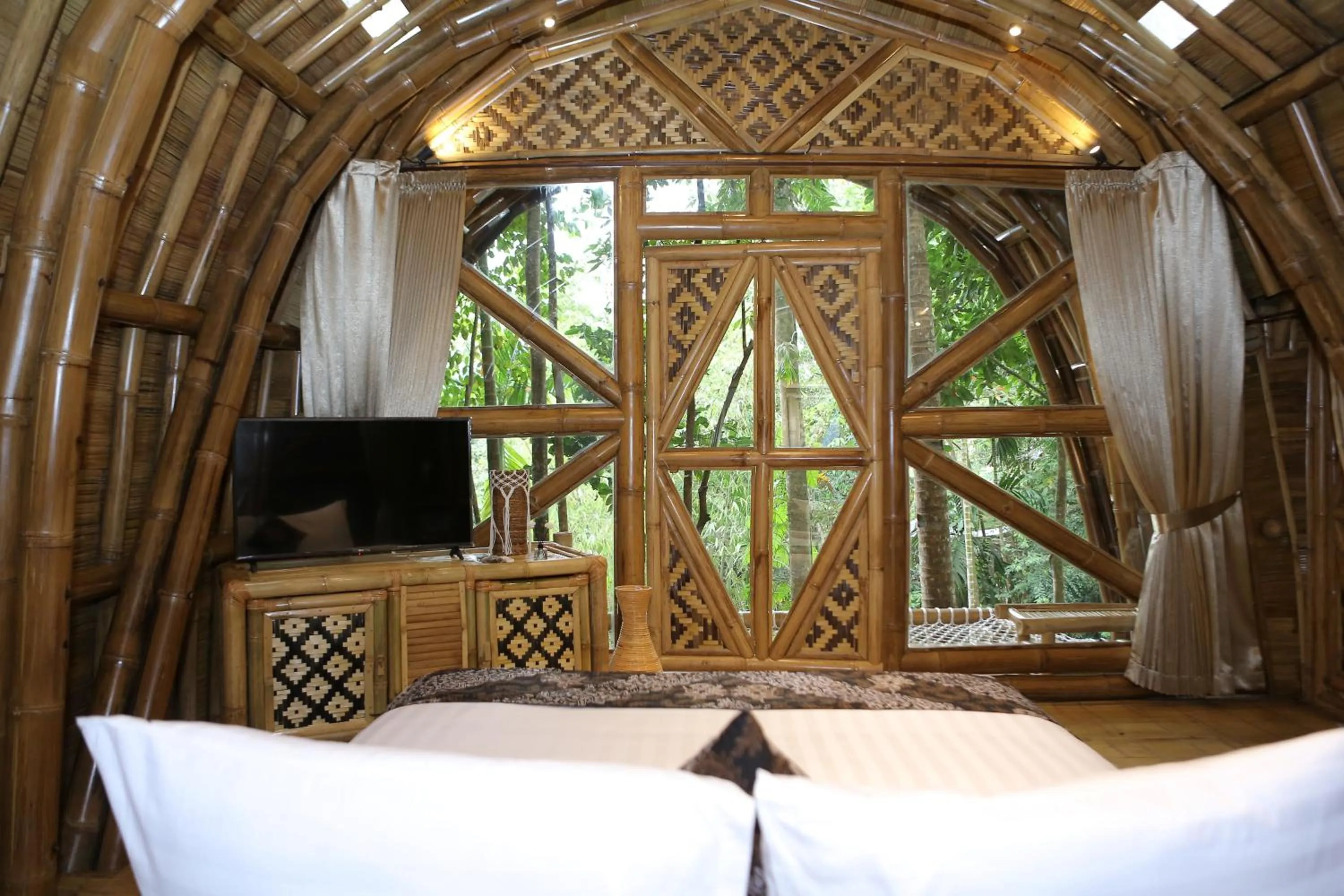 Bed in The Osing Bamboo Resort - a LIBERTA Collection