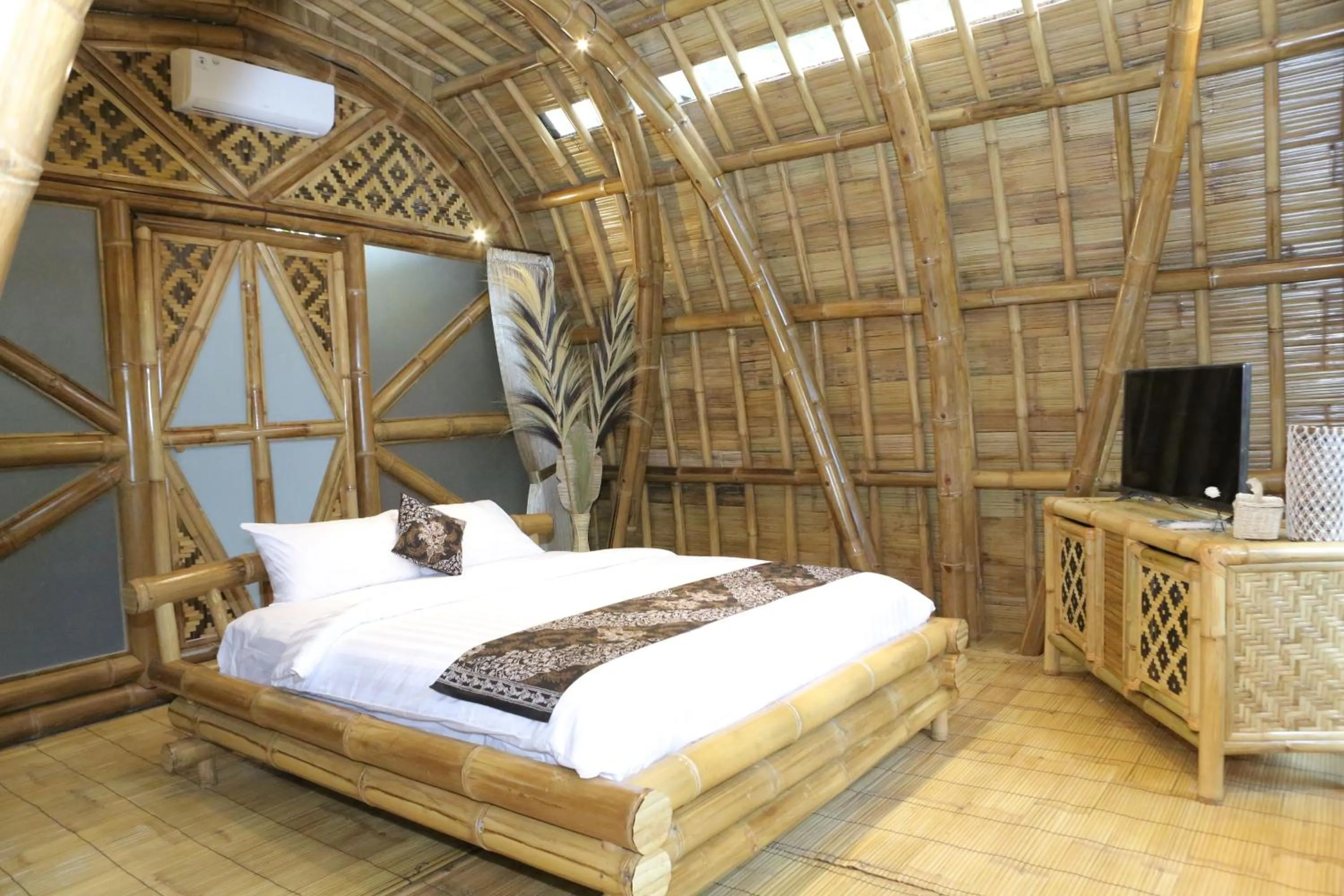 Bed in The Osing Bamboo Resort - a LIBERTA Collection