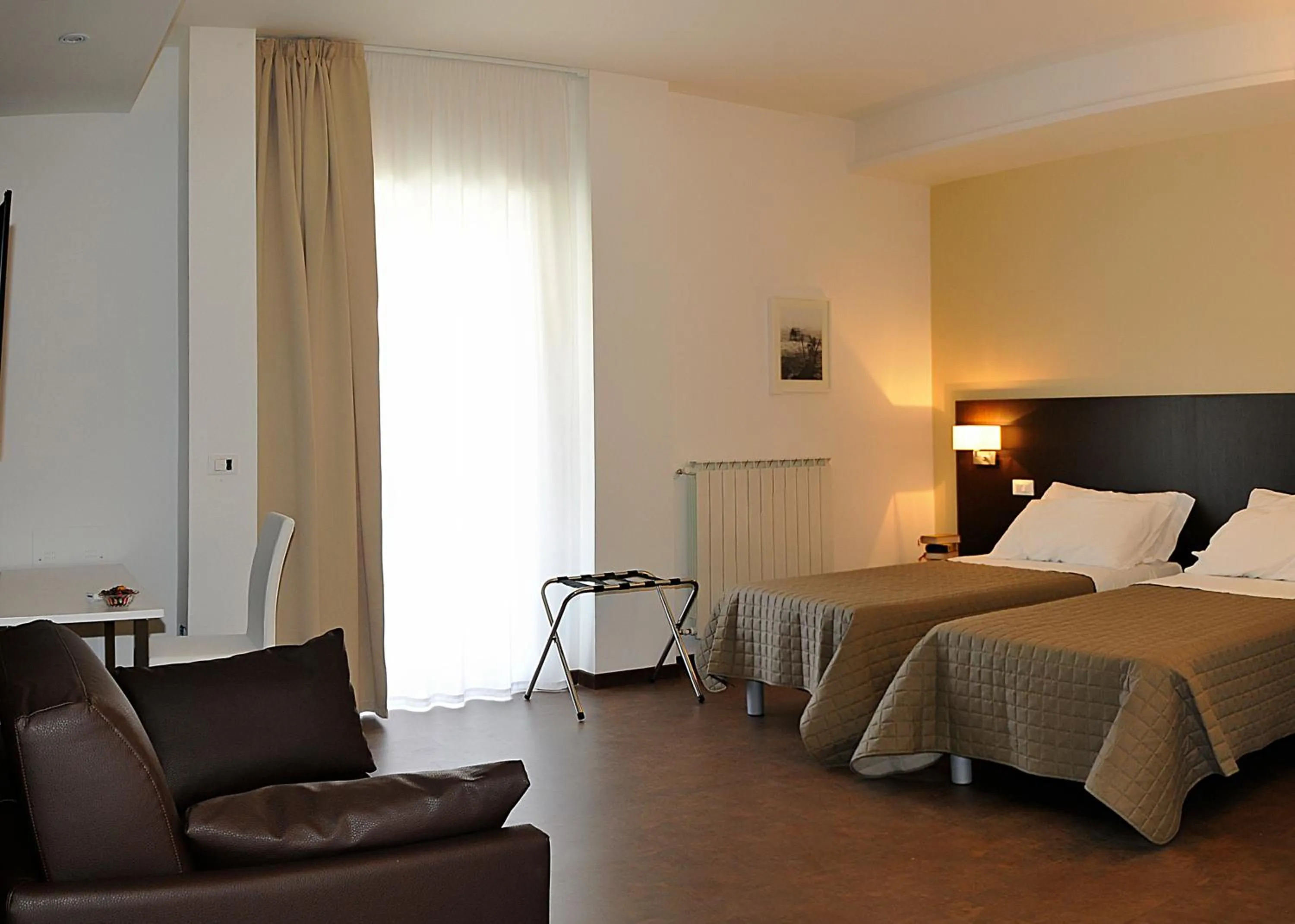 Photo of the whole room, Bed in Le Stanze Sul Corso
