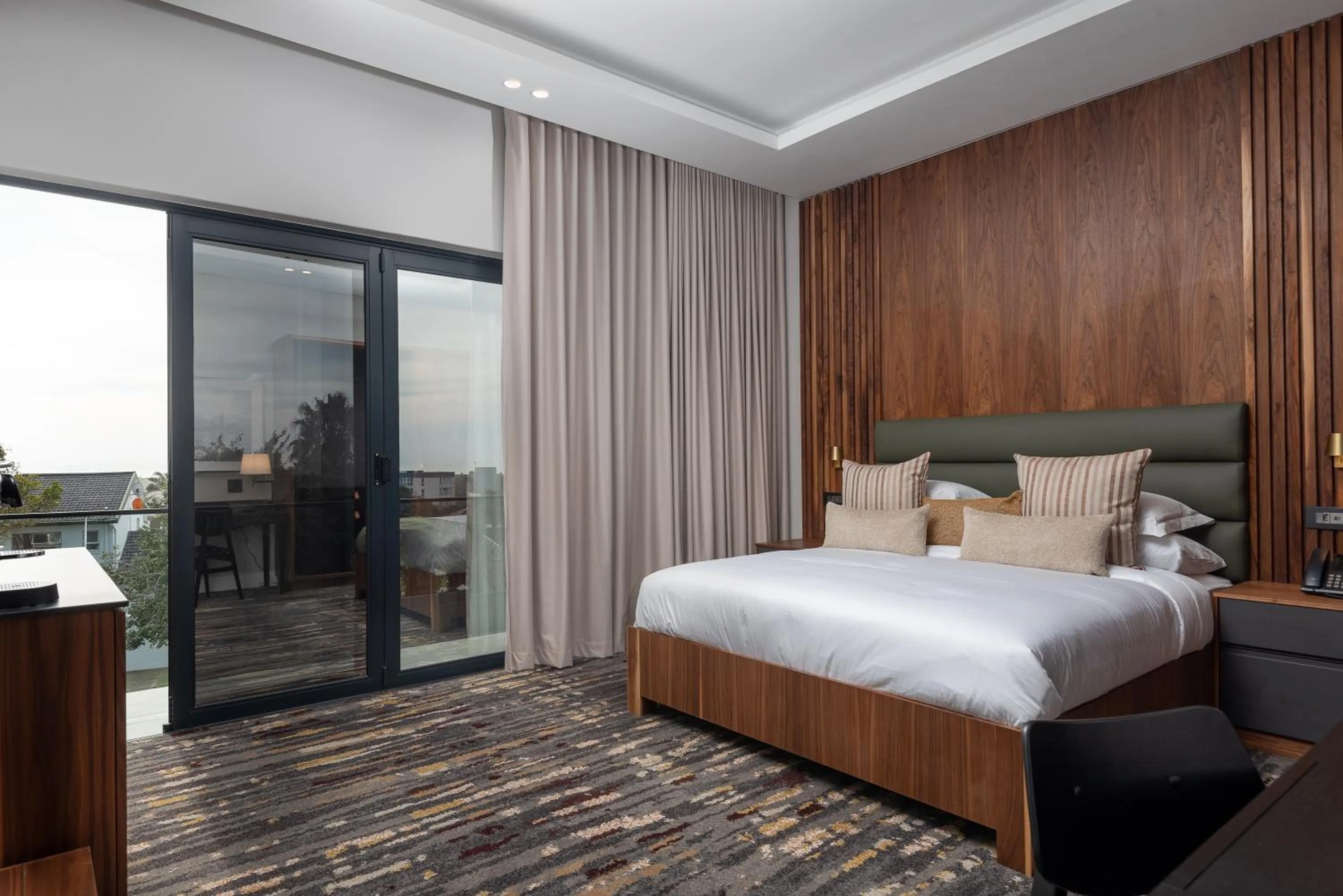 Bed in Anfani Boutique Hotel