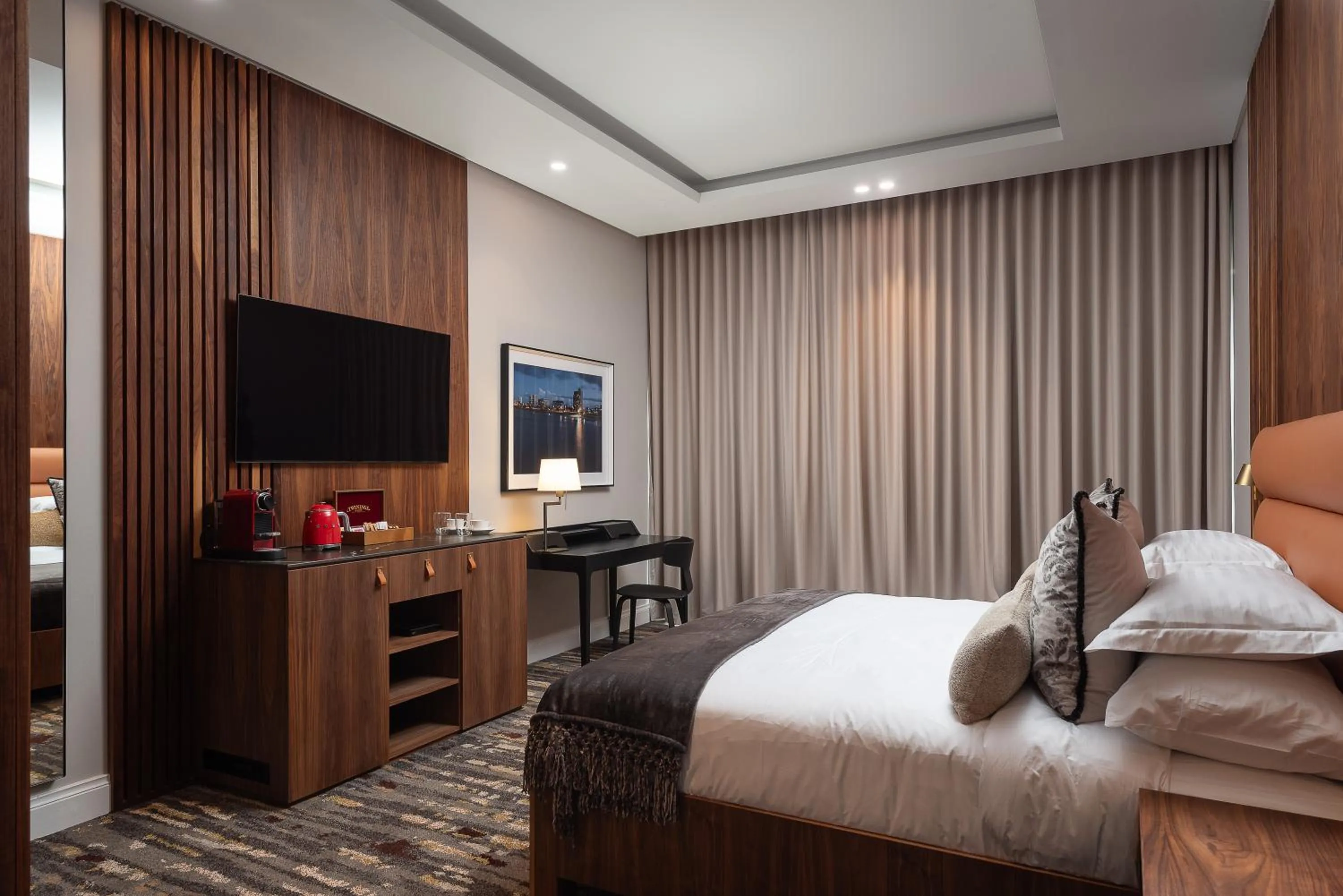 Communal lounge/ TV room in Anfani Boutique Hotel