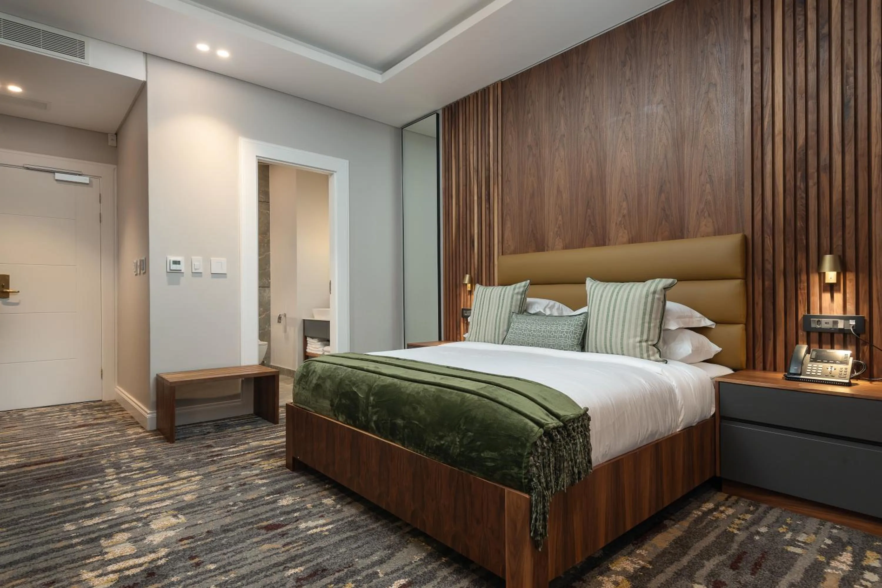 Bed in Anfani Boutique Hotel