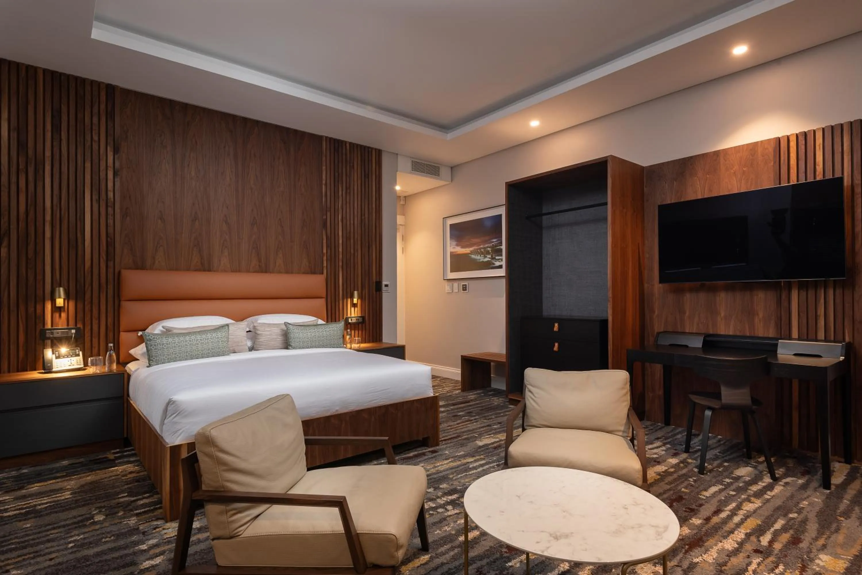 Communal lounge/ TV room in Anfani Boutique Hotel