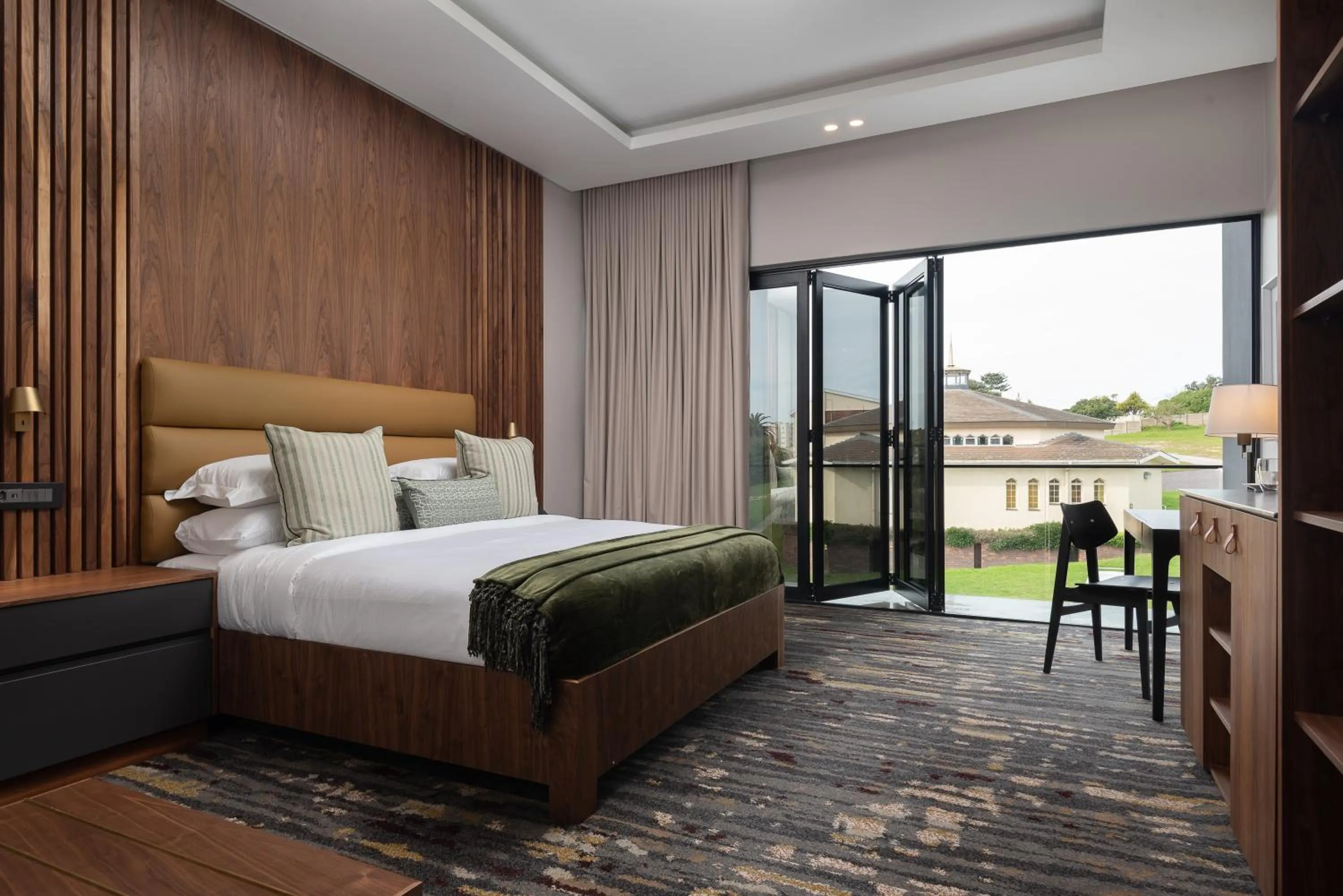 Bed in Anfani Boutique Hotel