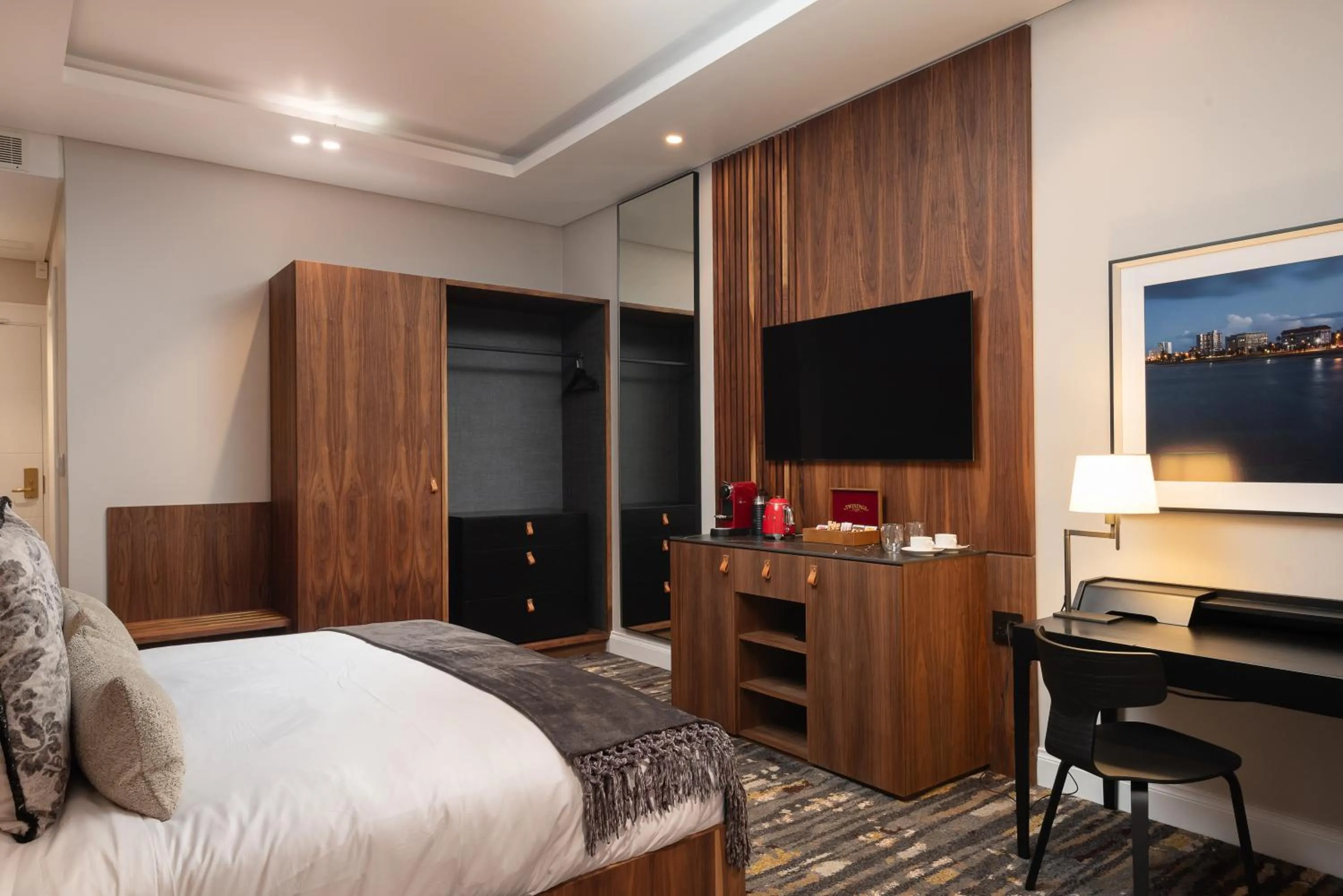 Communal lounge/ TV room in Anfani Boutique Hotel