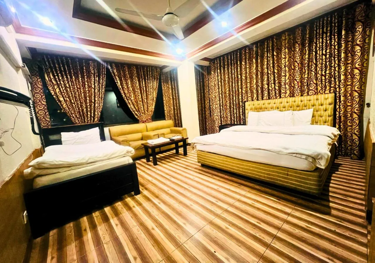 Bed in New Islamabad Hotel