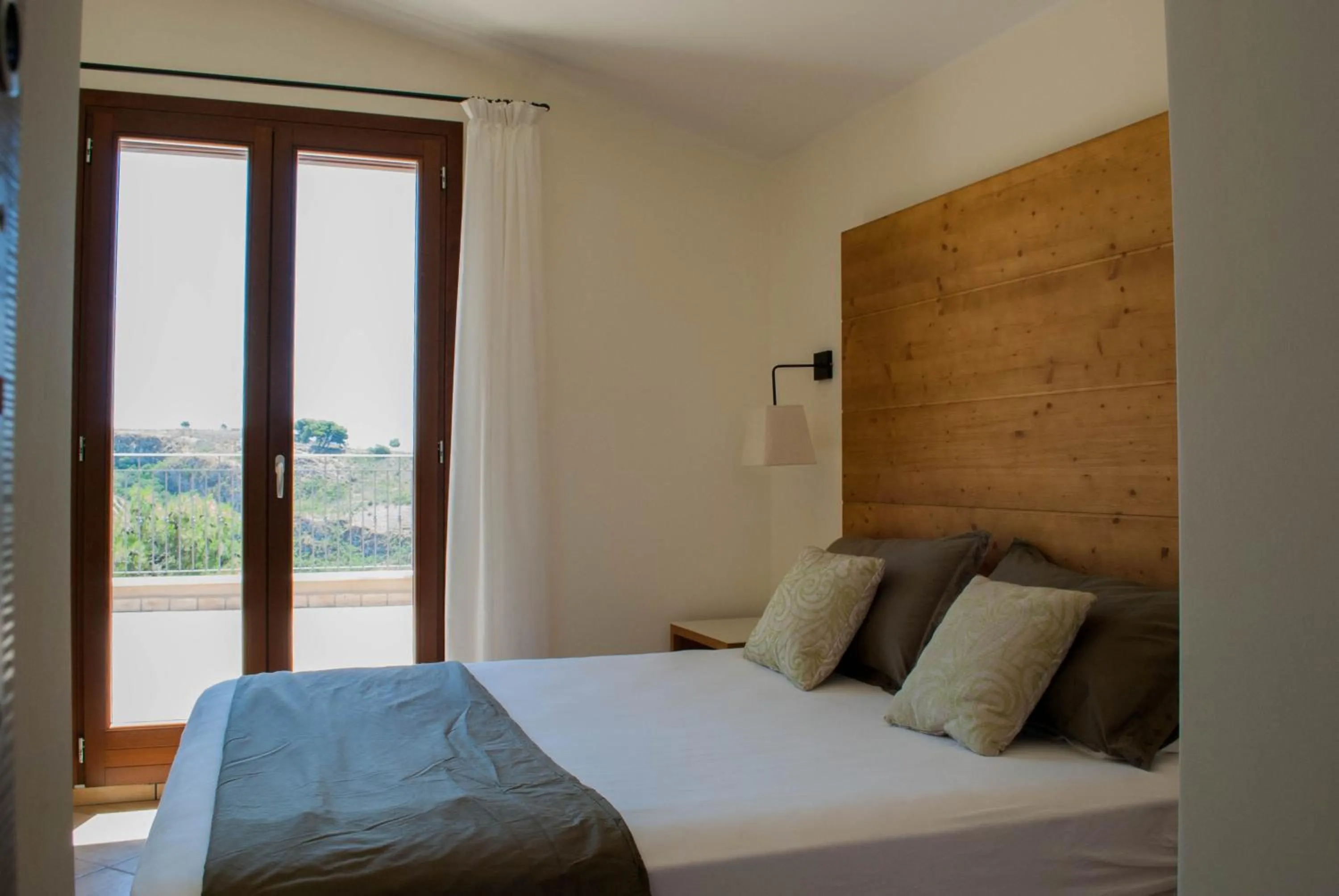 Photo of the whole room, Bed in Feudo Del Biviere