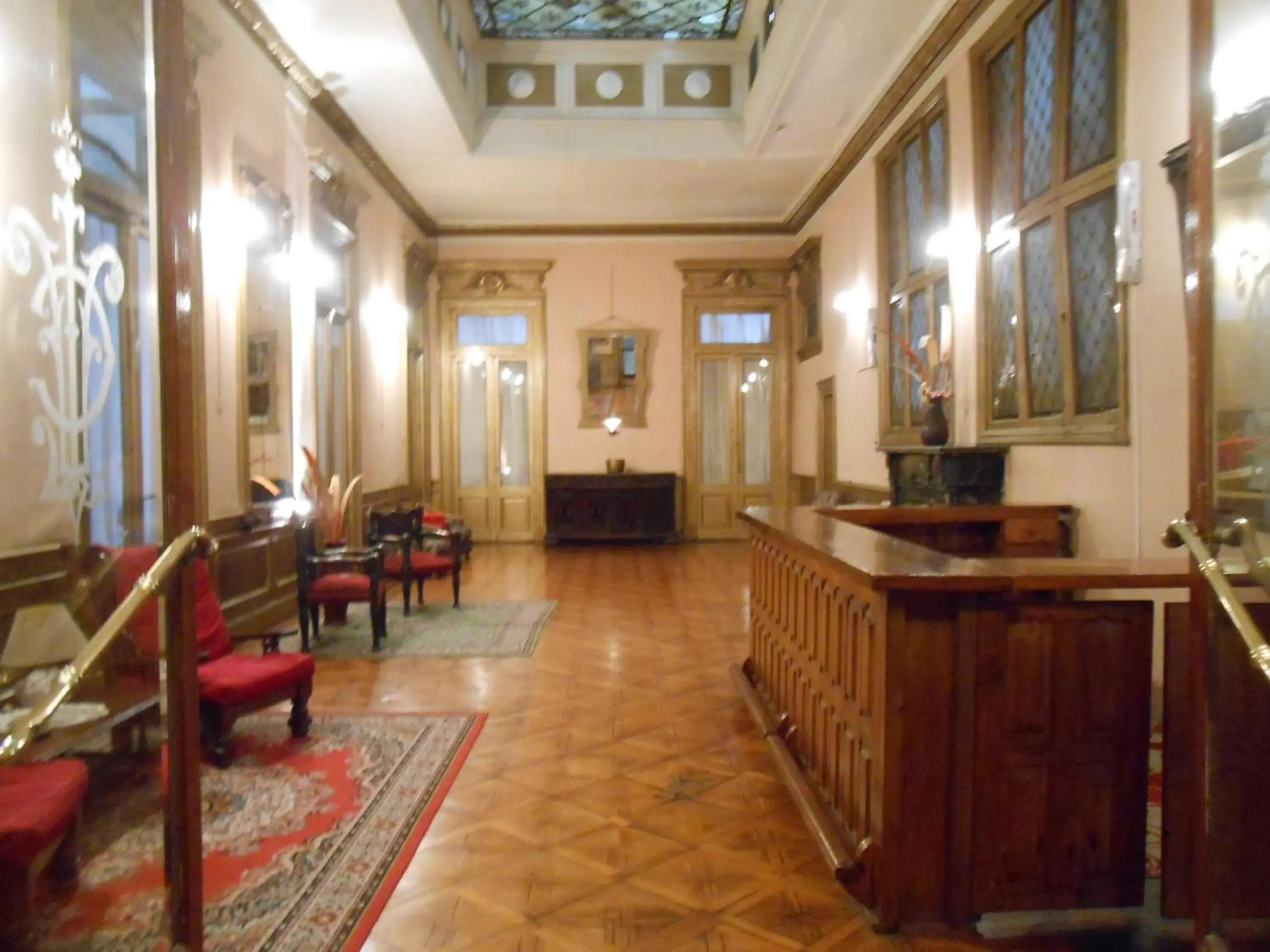 Lobby or reception in Hotel Reina Lobby or reception in Hotel Reina