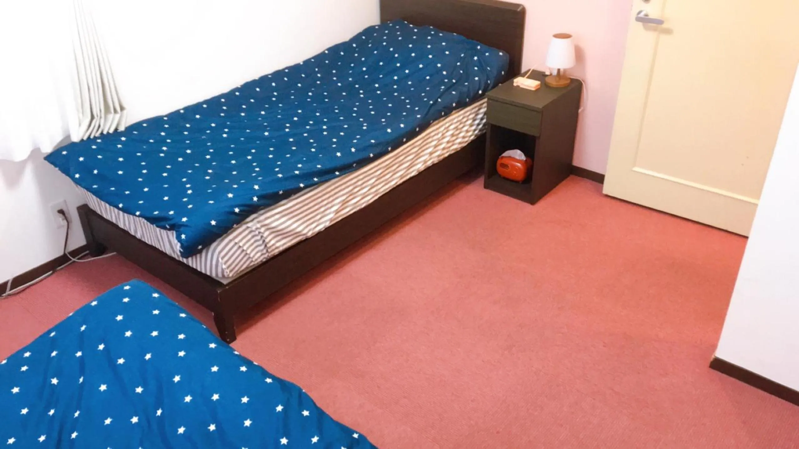 Bed in Hotel Yuni Star-Club