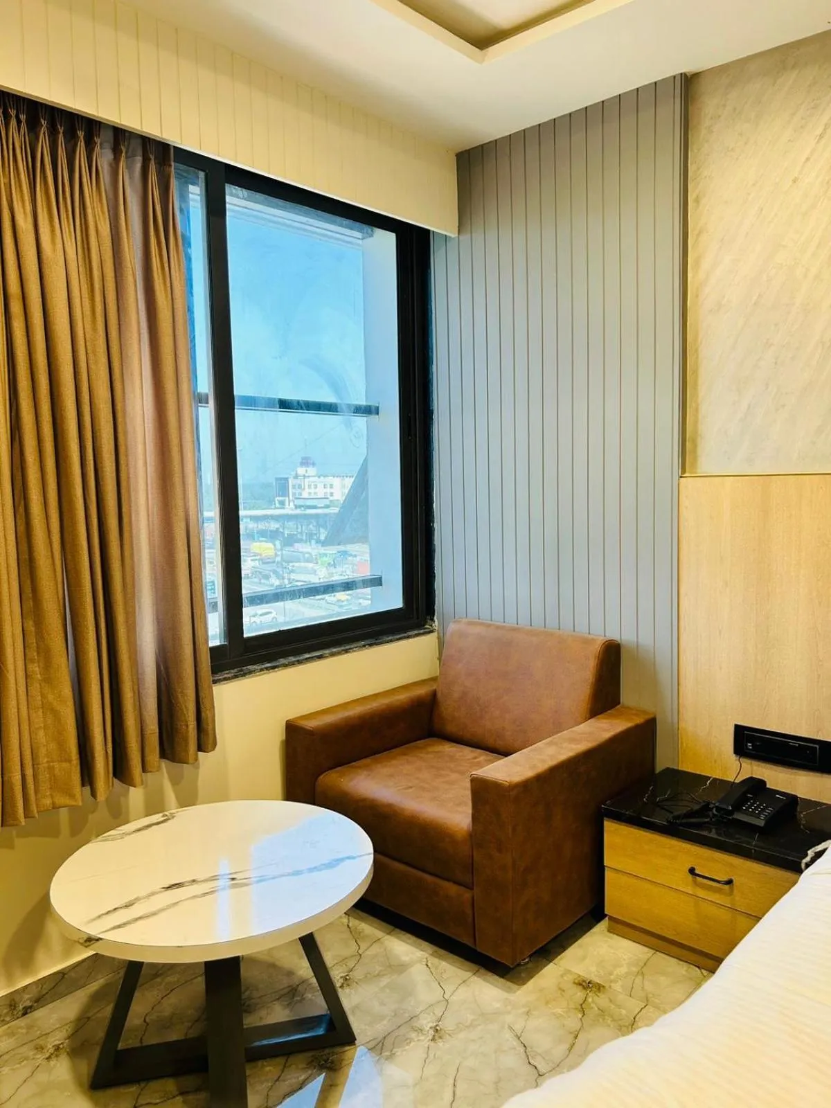 Seating area in Hotel Marigold Naroda