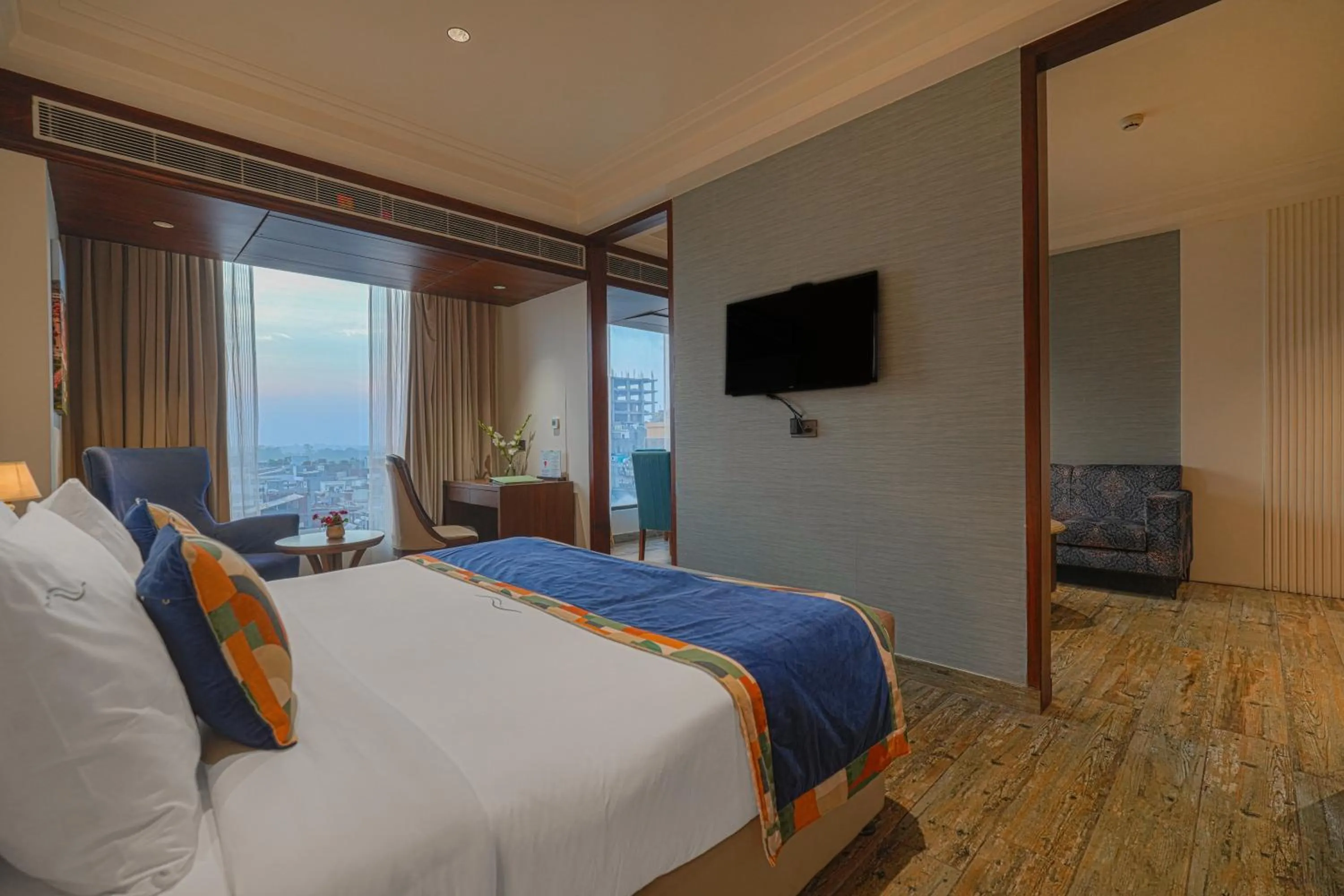 Communal lounge/ TV room, Bed in BluSalzz Residence Amritsar