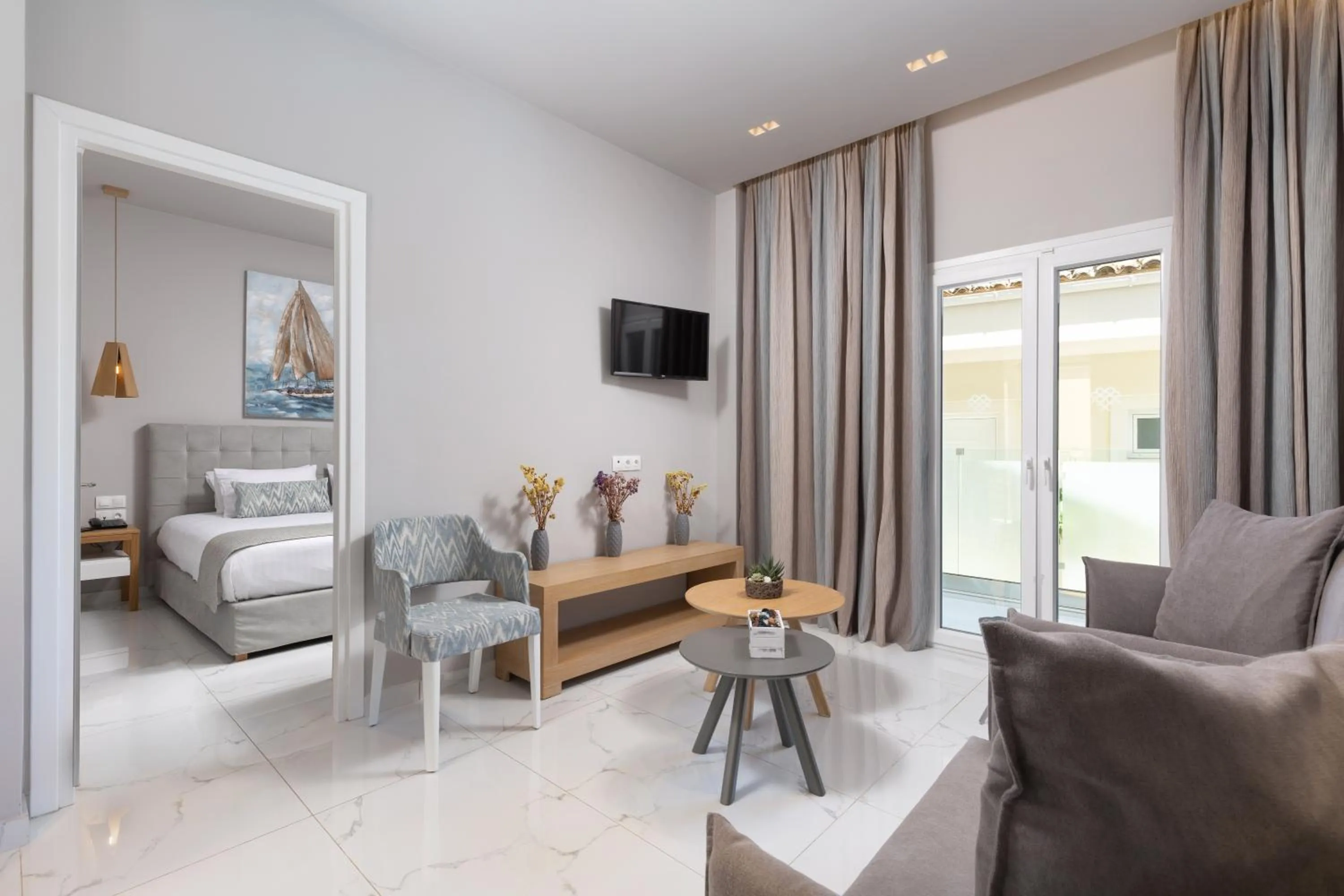 Bed in Melina Bay Boutique Hotel