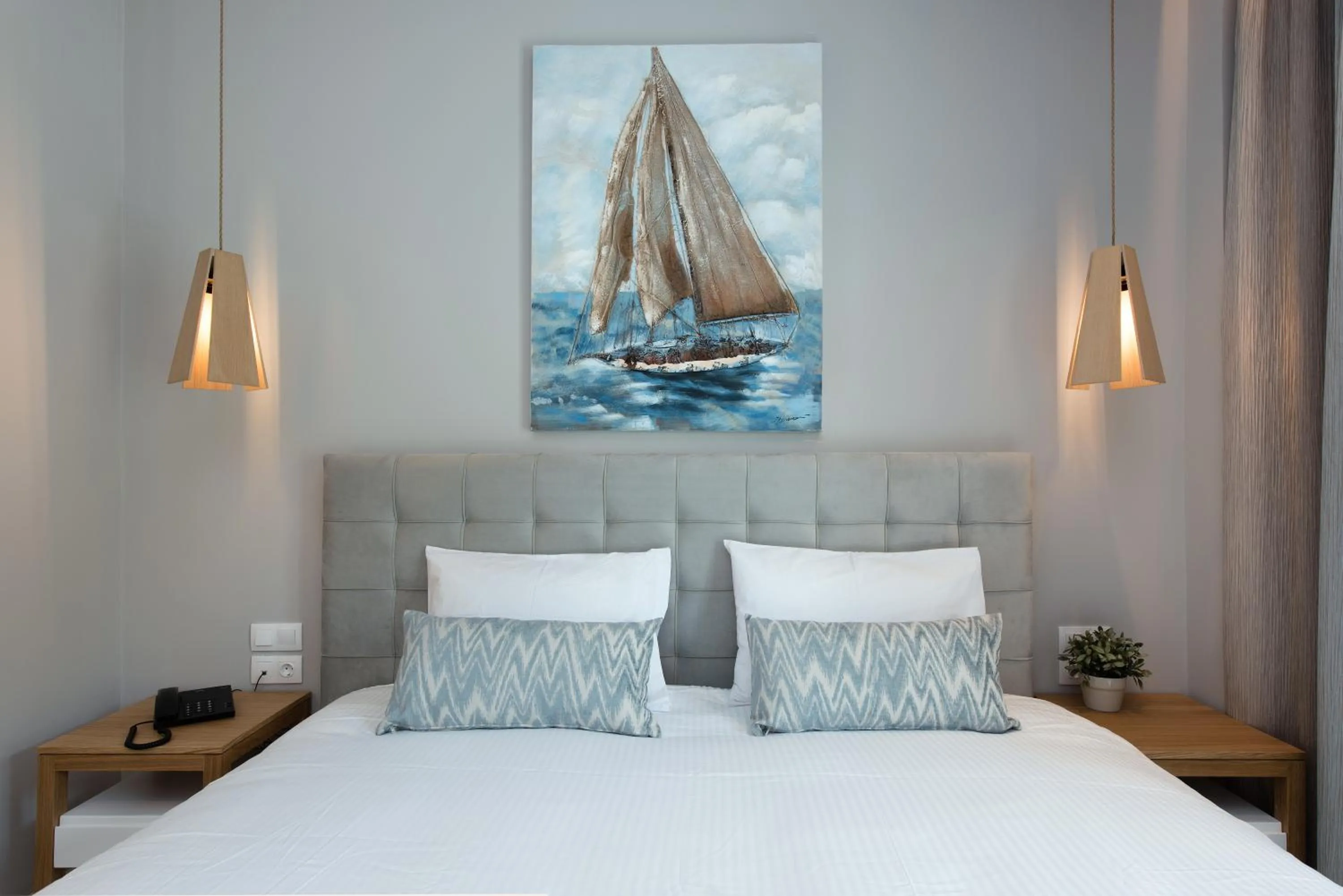 Bed in Melina Bay Boutique Hotel