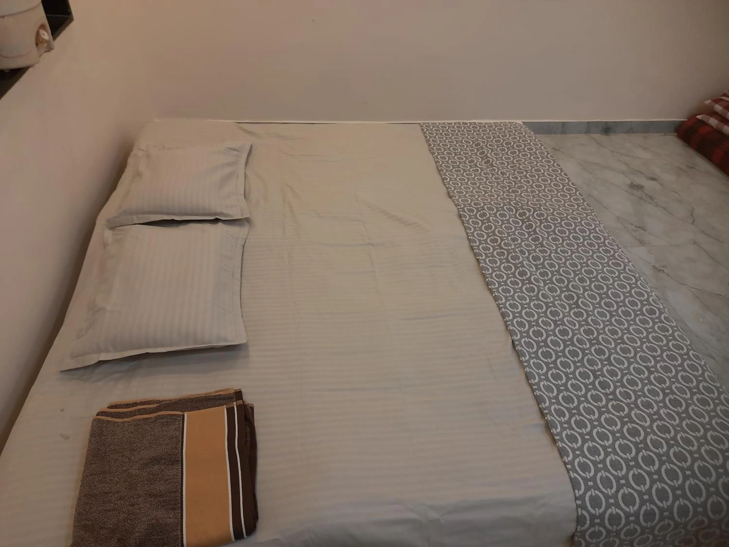 Bed in Shriguru Guest House Akkalkot