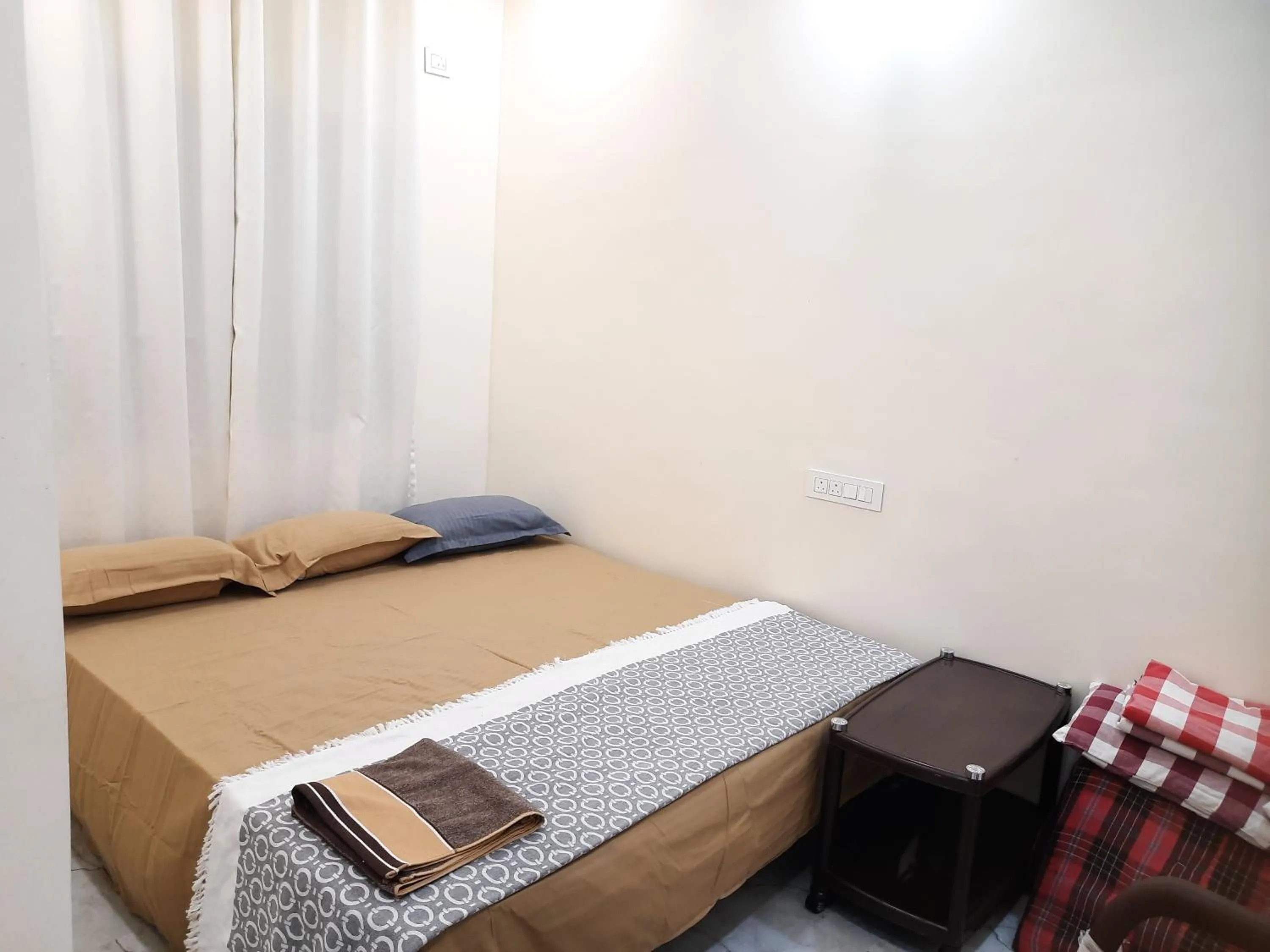Bed in Shriguru Guest House Akkalkot