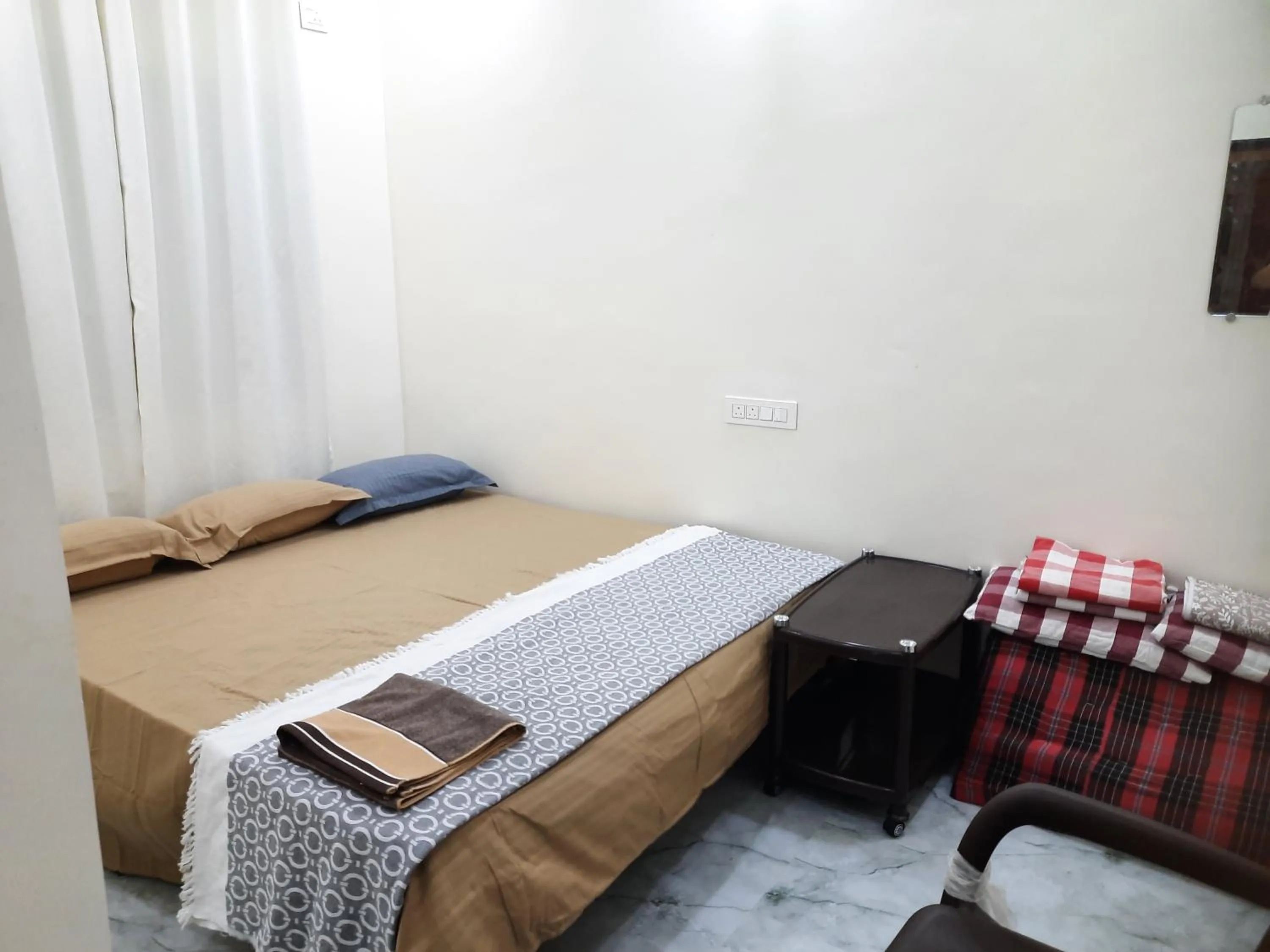 Bed in Shriguru Guest House Akkalkot