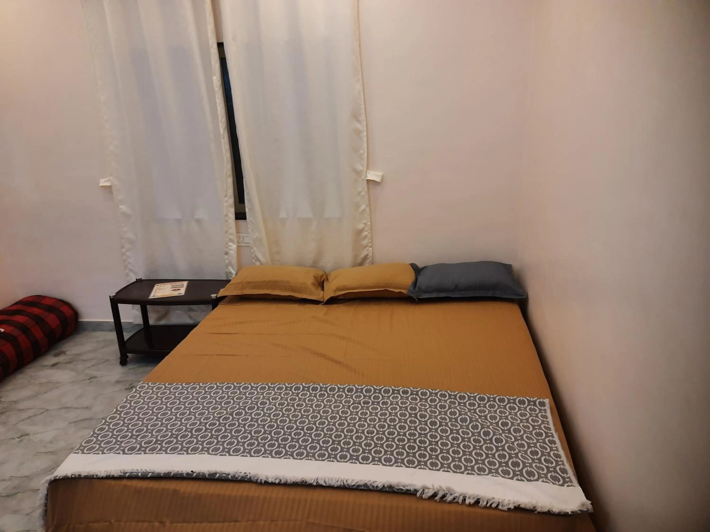 Bed in Shriguru Guest House Akkalkot