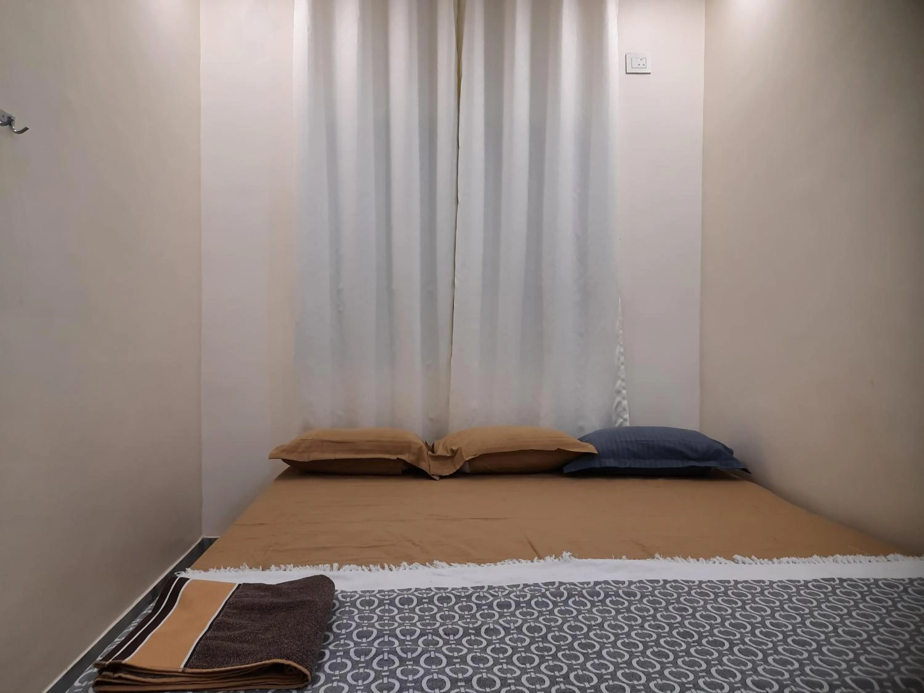 Bed in Shriguru Guest House Akkalkot