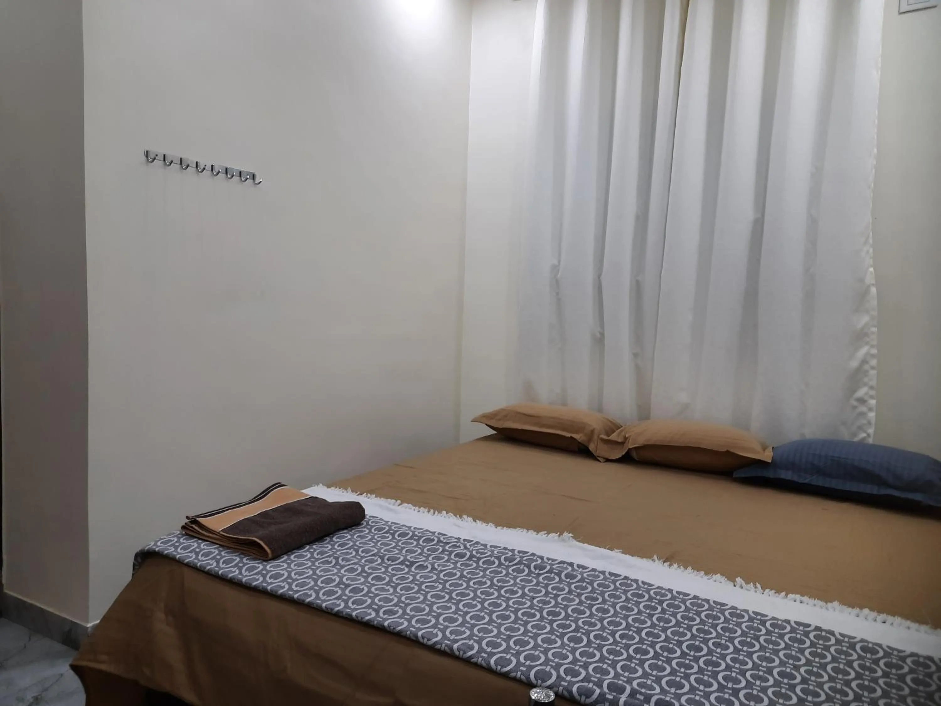 Bed in Shriguru Guest House Akkalkot