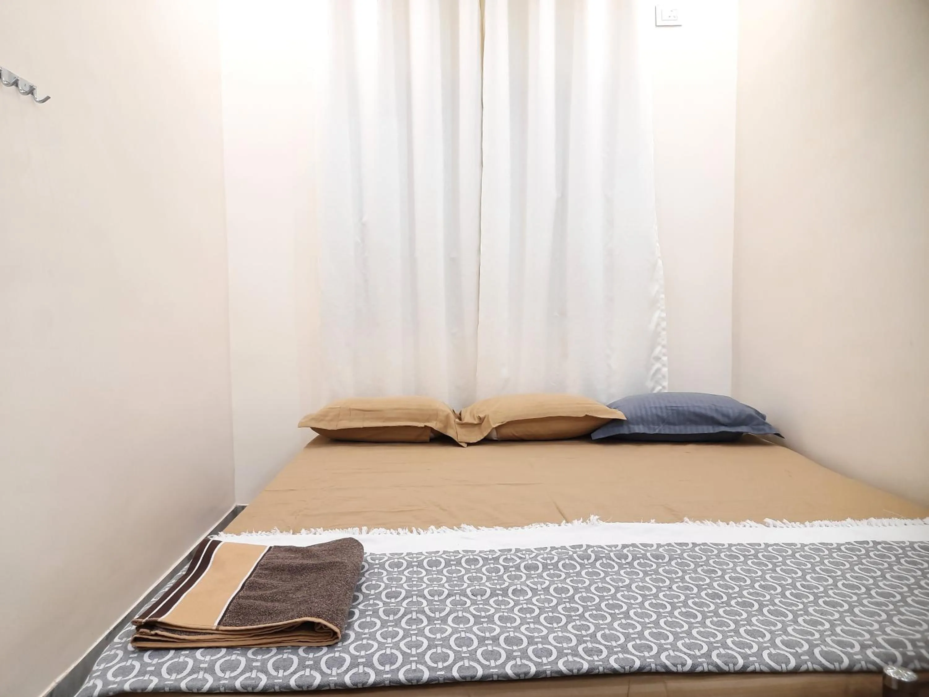 Bed in Shriguru Guest House Akkalkot