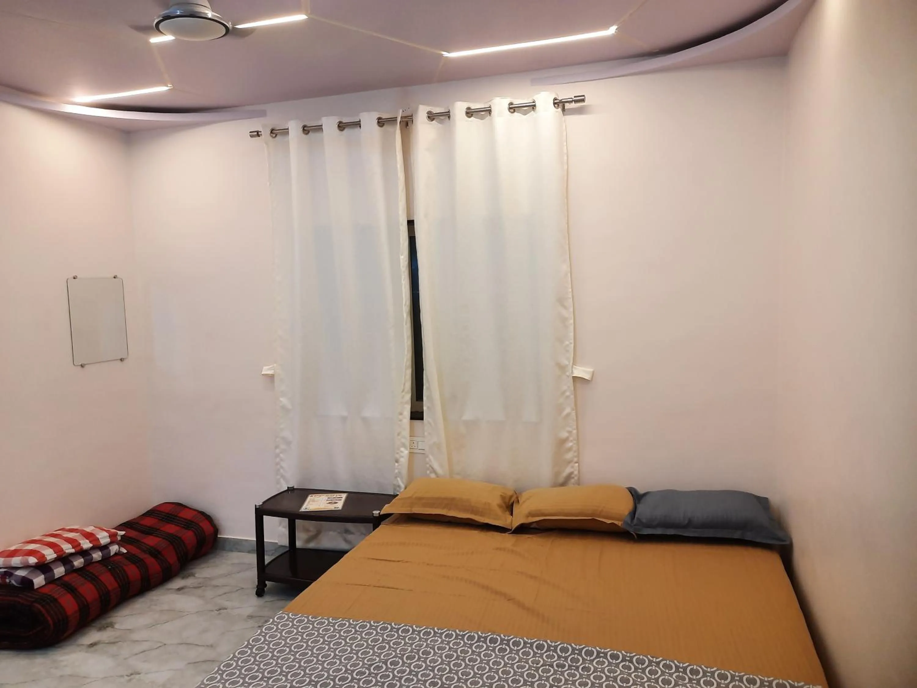 Bed in Shriguru Guest House Akkalkot