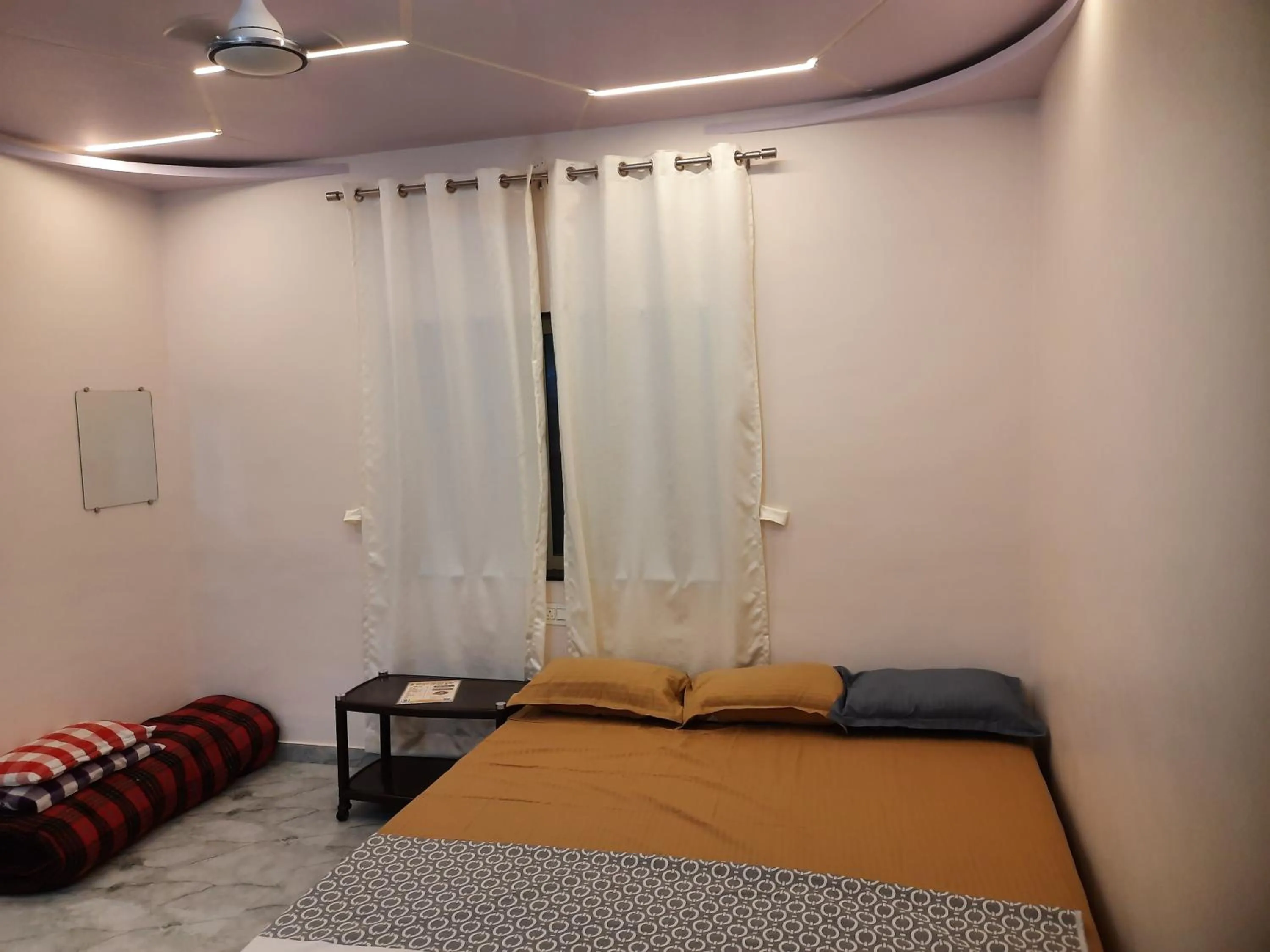 Bed in Shriguru Guest House Akkalkot