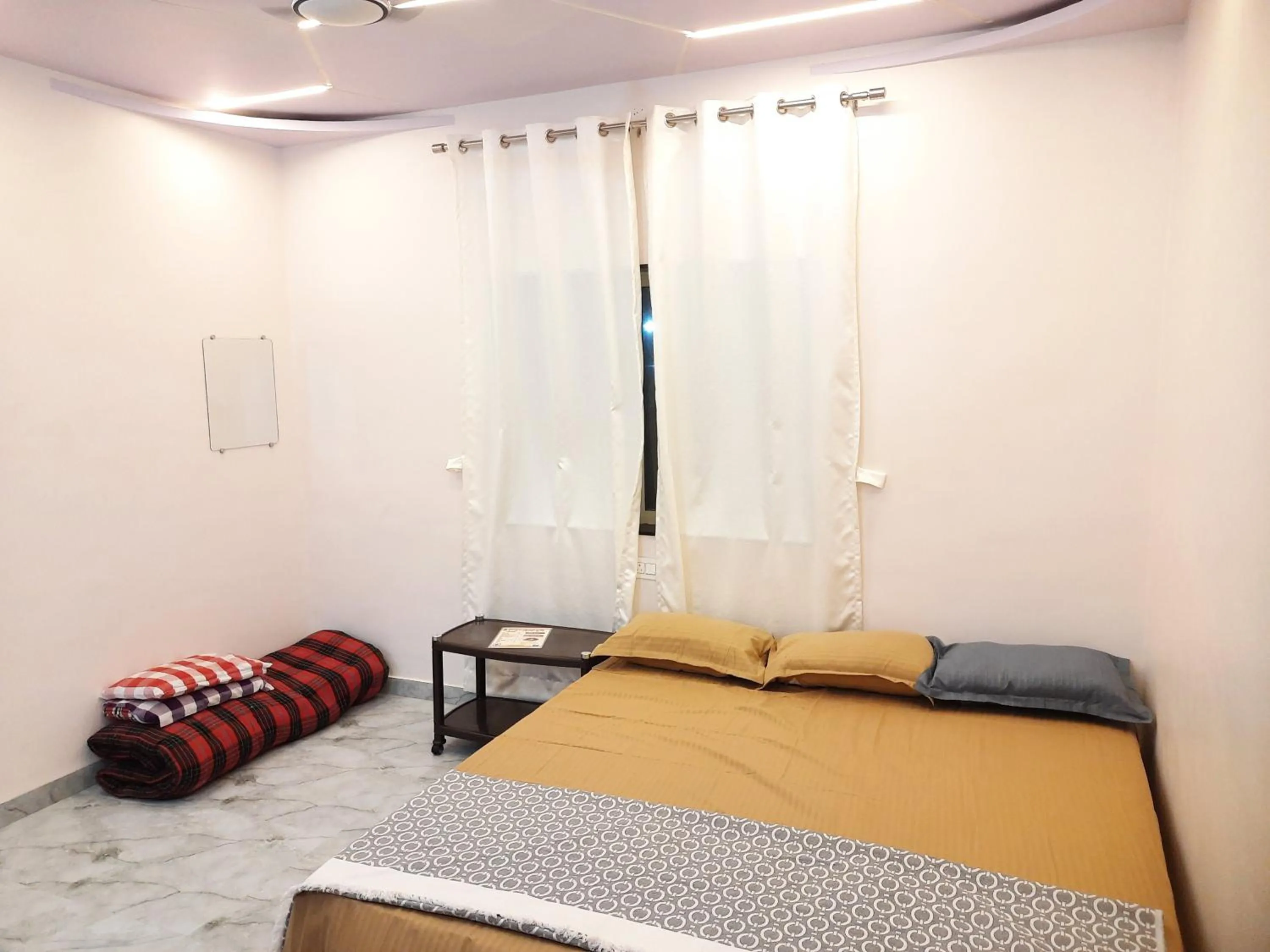 Bed in Shriguru Guest House Akkalkot