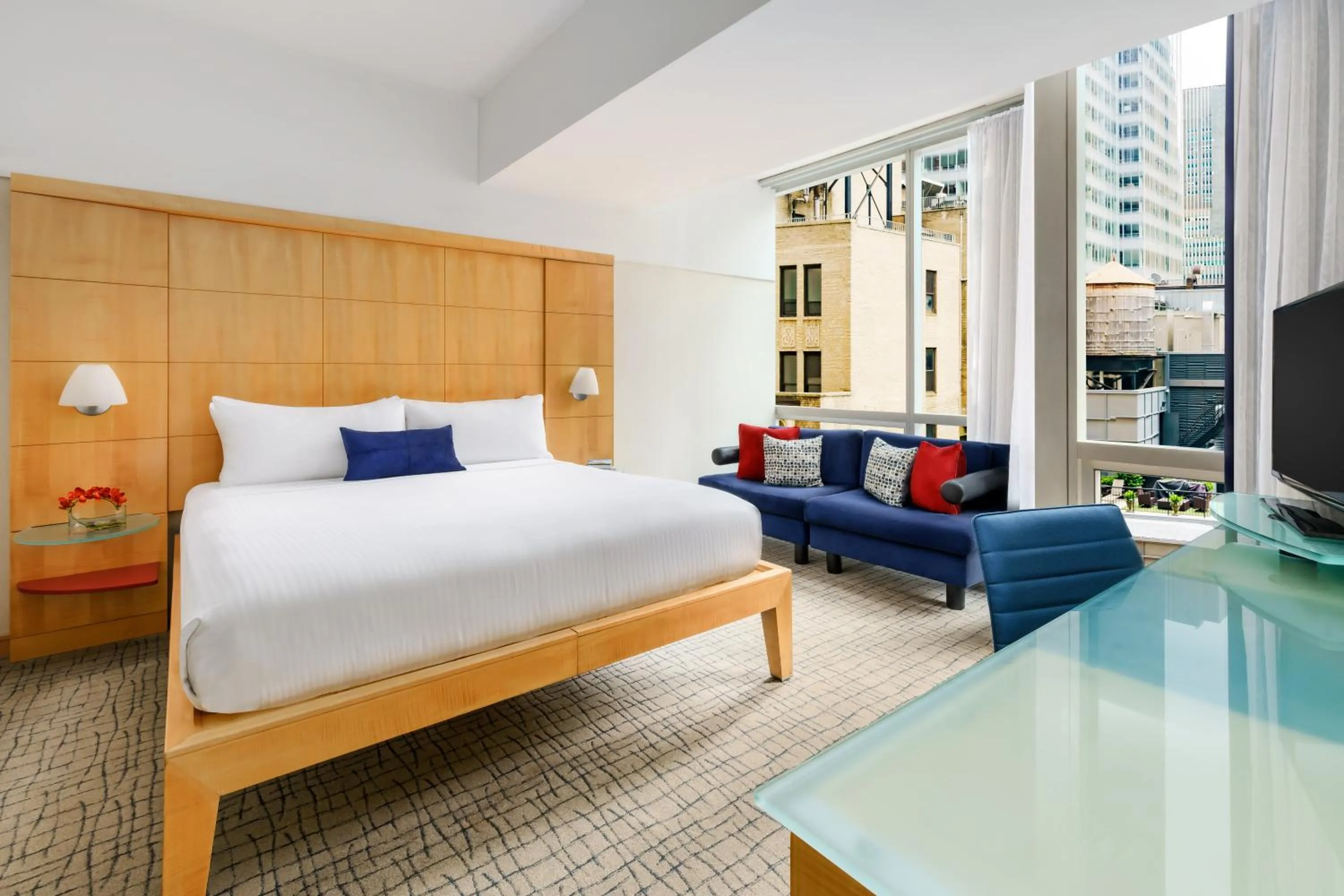 Photo of the whole room, Bed in Millennium Premier Hotel New York Times Square