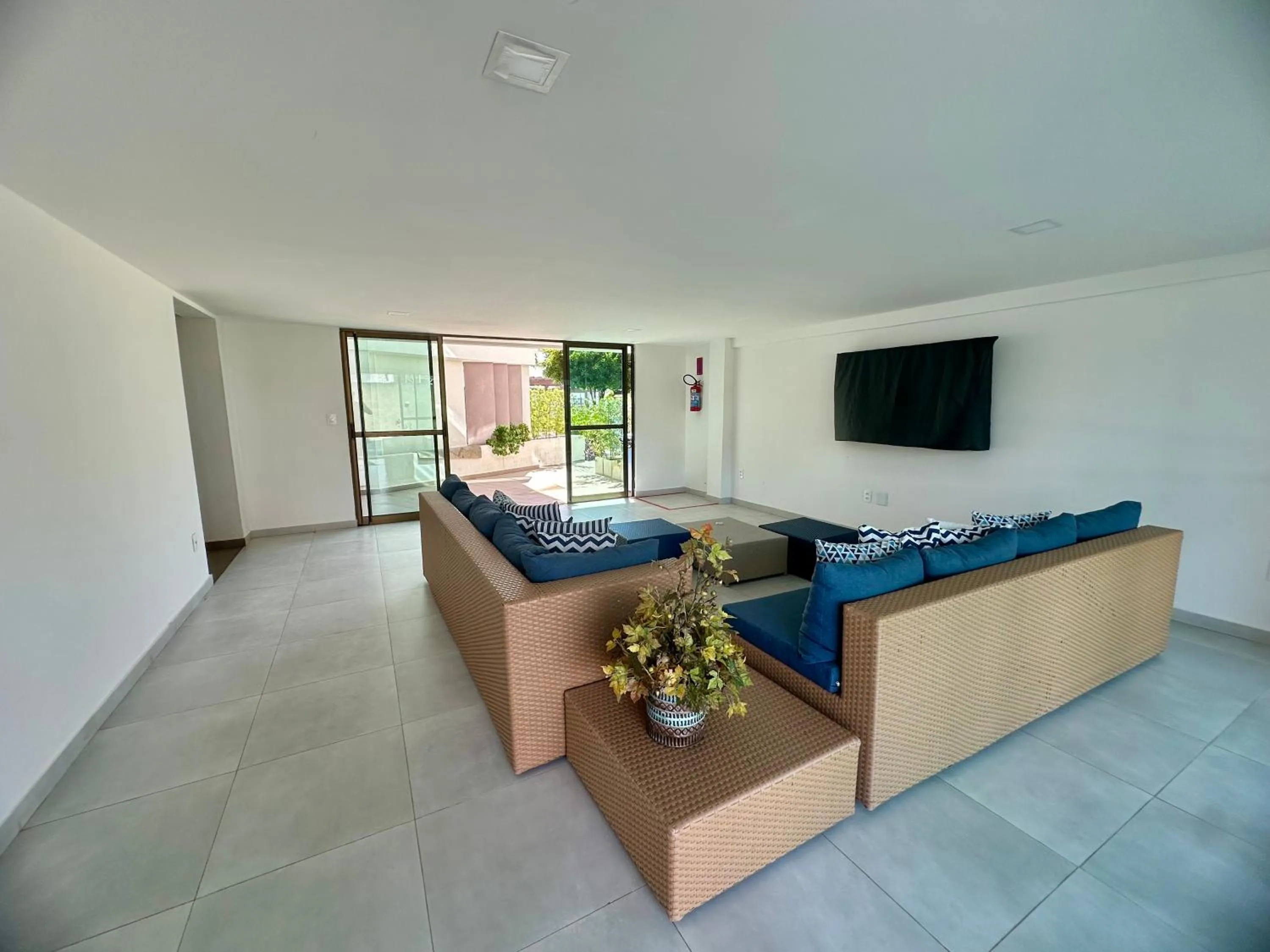 Communal lounge/ TV room in Flat Luxo - Pé na Areia - Maui Beach Residence