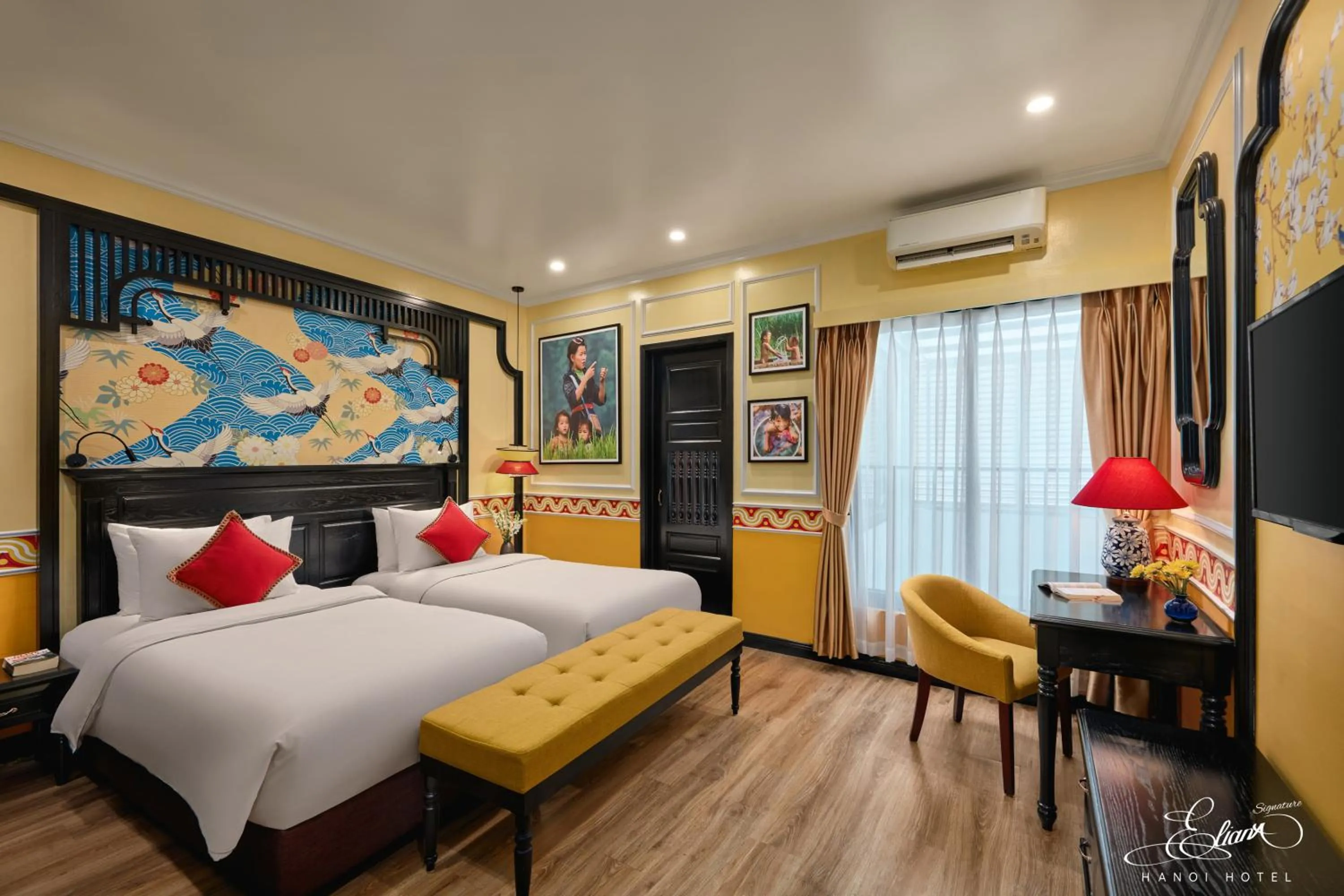 Communal lounge/ TV room, Bed in Eliana Signature Hanoi Hotel