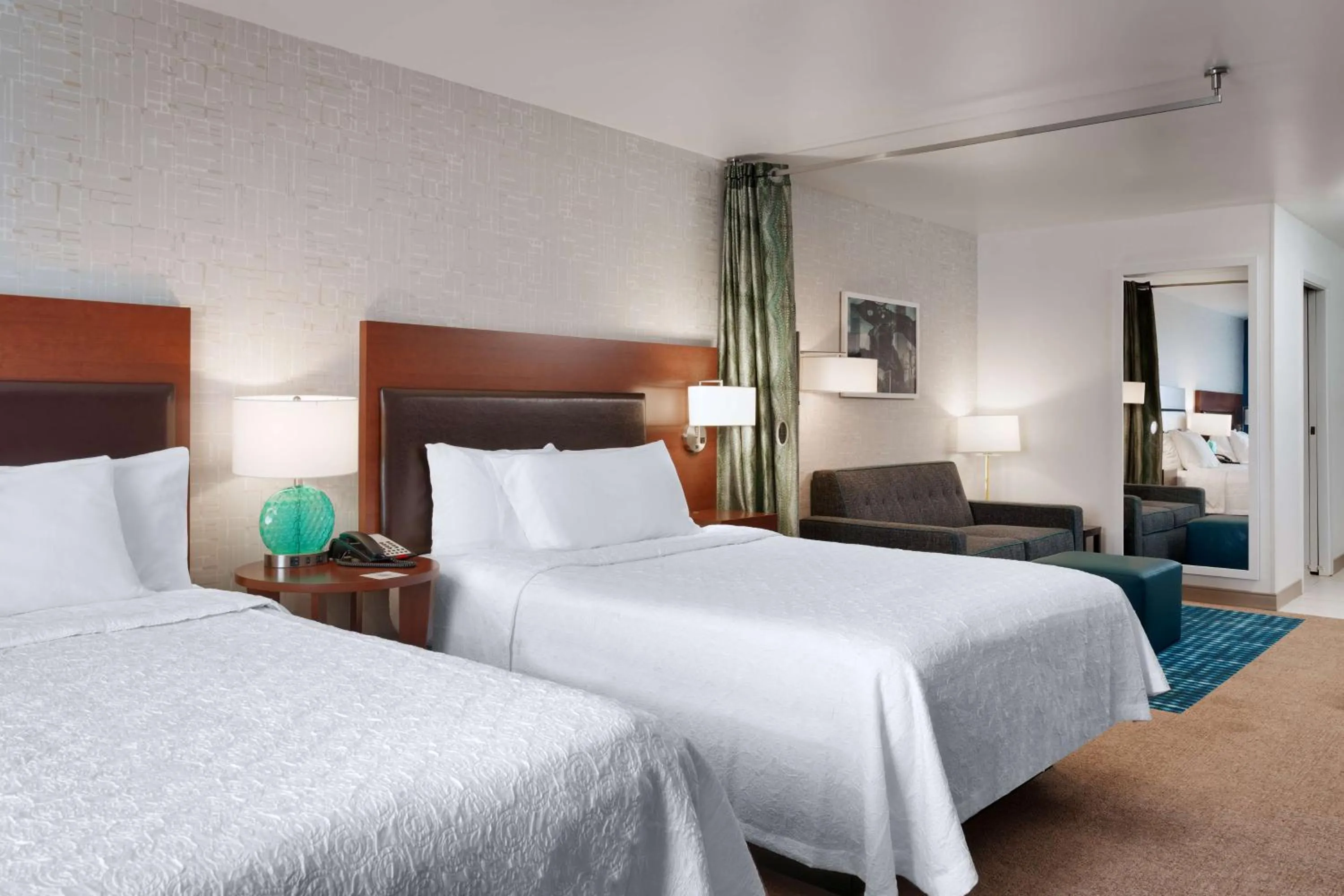 Living room, Bed in Home2 Suites by Hilton Houston Katy