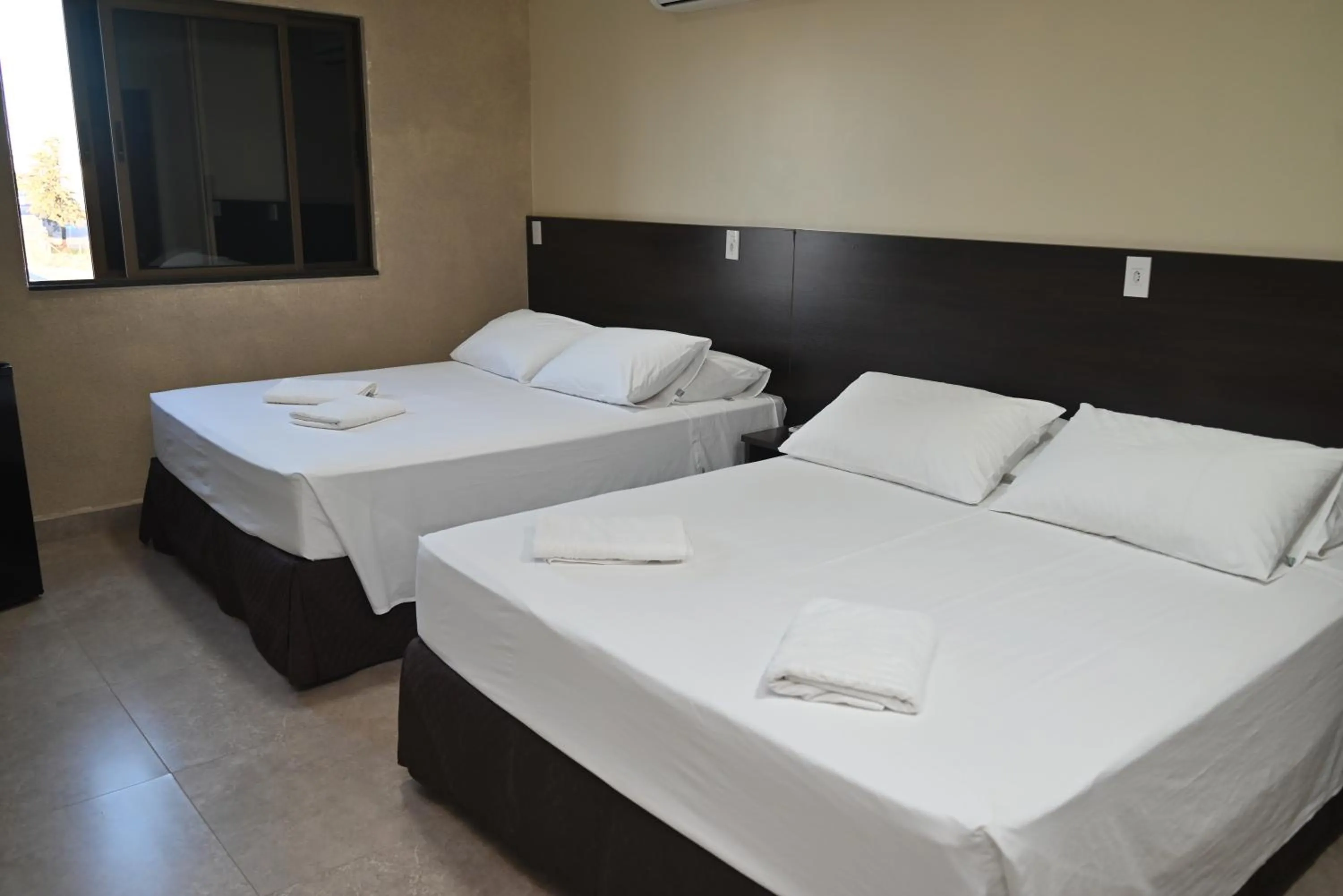 Bed in Master Gold Hotel Express